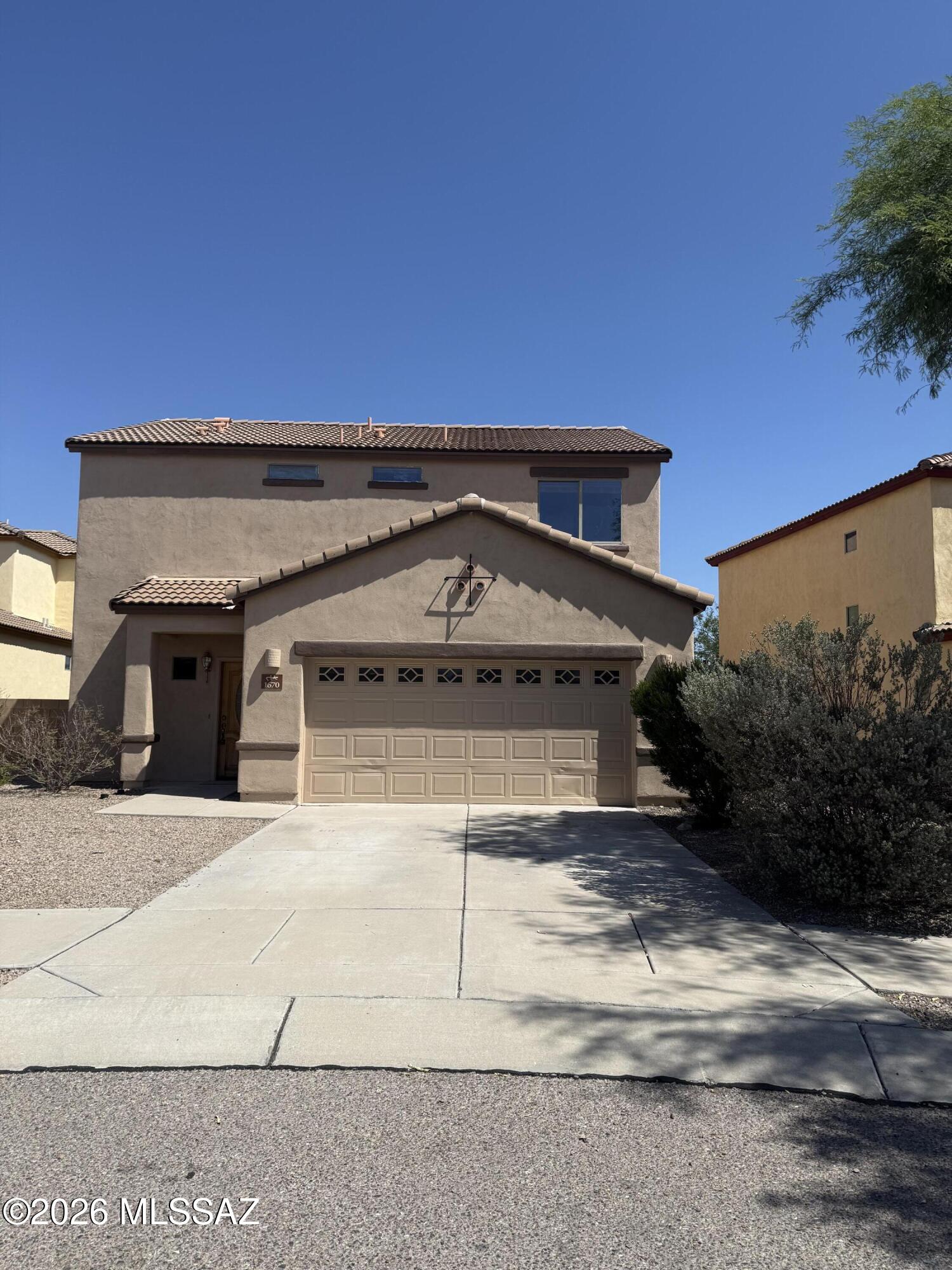 Beautiful 3-bedroom, 2-bathroom home with a 2-car garage, boasting spacious living areas and modern amenities. The great room features a separate dining area, perfect for entertaining guests or enjoying family meals. The large master bedroom includes a huge walk-in closet, offering both comfort and convenience. The kitchen is equipped with all appliances and features a convenient breakfast bar, ideal for casual dining or quick meals. Brand new carpet and hardwood laminate flooring throughout the home, making maintenance easier and offering a sleek, contemporary look. Conveniently located with easy access to I-10, just a short 10-minute drive to Downtown Tucson, offering access to restaurants, arts, culture, and more.

Surrounded by mountain views, you can enjoy the desert views.