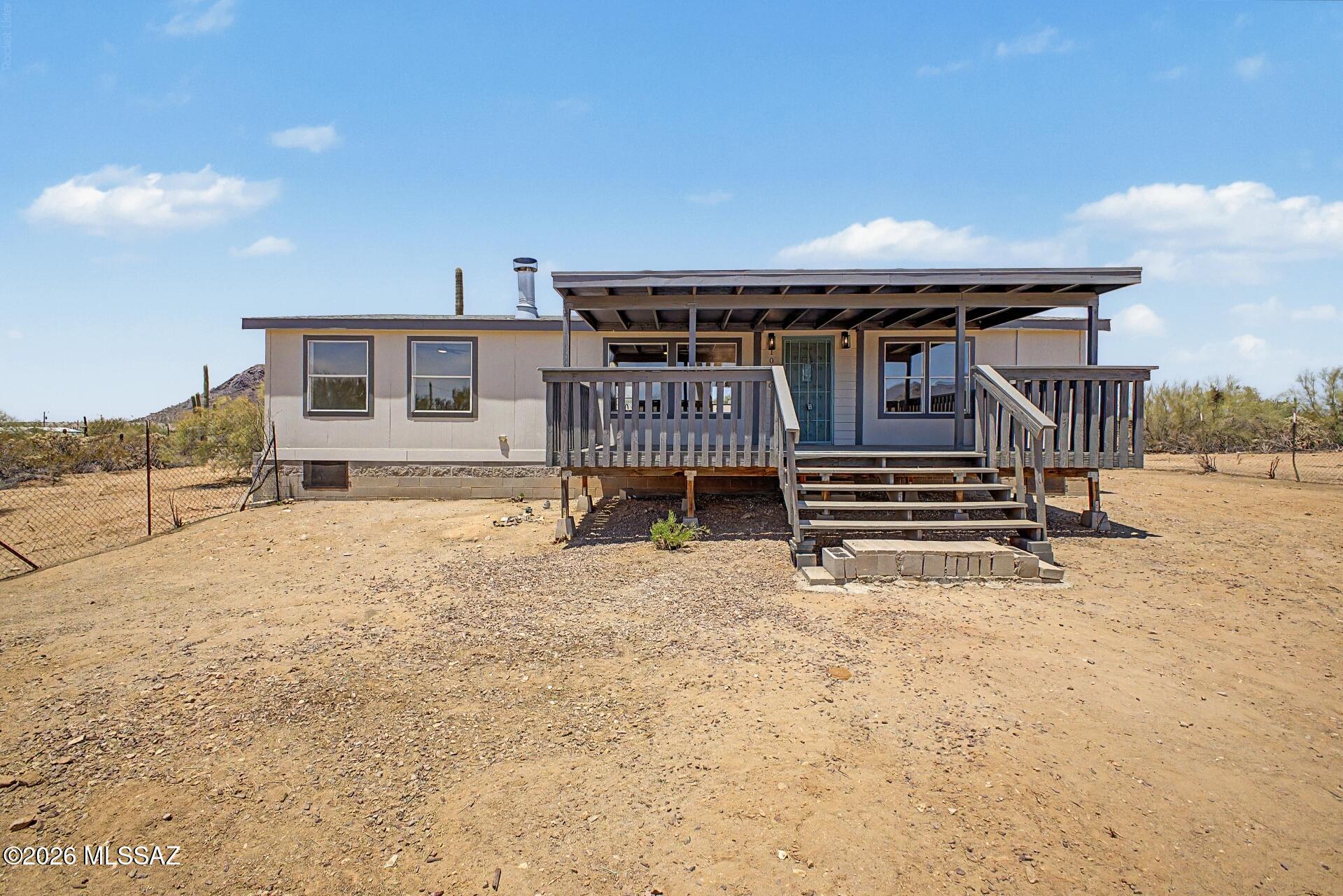 Great opportunity for homeownership! Spacious manufactured home situated on a full acre. Features 3 bedrooms, 2 bathrooms.  Updated with Luxury plank flooring, Modern fixtures, new counter tops, stainless steel appliances, fresh interior/exterior paint and more!   Zoned for horses and perfect for those seeking a relaxed rural lifestyle. A must-see!