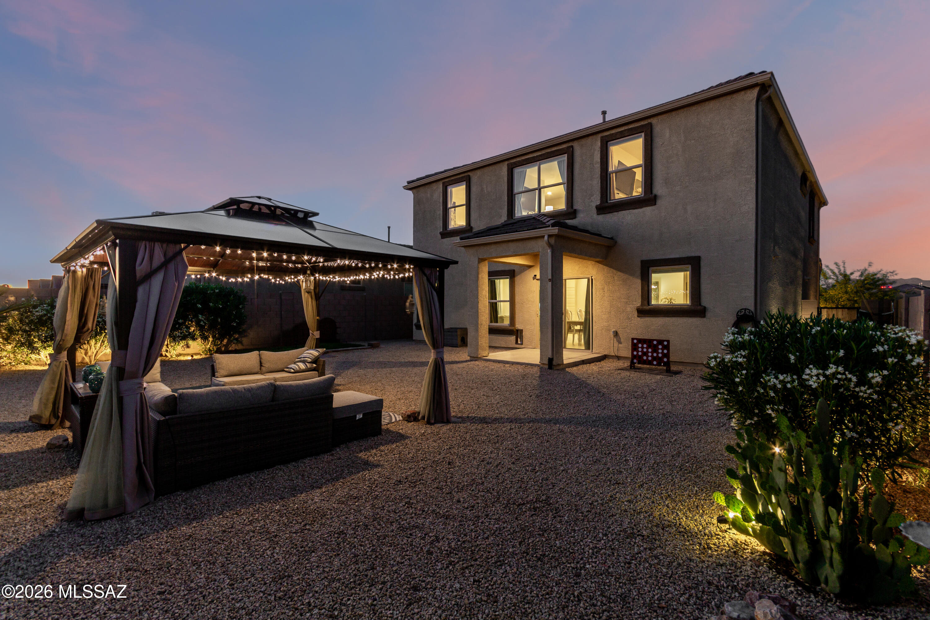 Located in the sought-after Saguaro Bloom community, this spacious 2-story home offers 5 bedrooms and 3 baths with thoughtful upgrades throughout. The sellers have made numerous upgrades and investments into the home, enhancing both comfort and functionality. The den has been converted into a true 5th bedroom, perfect for guests or a home office. Enjoy modern dining room lighting, ceiling fans, and energy-efficient cellulose honeycomb blinds. The backyard is ready for entertaining with a gazebo and storage shed included. Security cameras convey for added value and peace of mind. You dont wan to miss out on this one, call for a private our today!