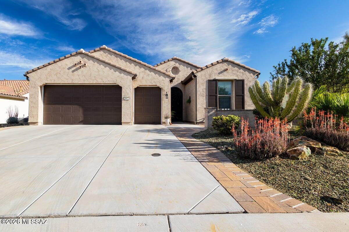 Experience resort-style living in this stunning Partially Furnished home, ideally located on the golf course in the prestigious gated community of Quail Creek. Enjoy breathtaking mountain views and rare privacy both front and back. This beautifully designed residence showcases soaring ceilings, abundant natural light and expansive windows that frame the exceptional surroundings. The open concept floor plan features ceramic tile flooring except bedrooms, a gracious dining area complete with a built in serving area and generous storage, and easy flow to spacious great room and sliding doors leading to the covered patio. The chef's kitchen is both stylish and functional, offering SS appliances, quartz countertops and pull out shelves. Each bedroom has an en-suite bath. Epoxy 2.5 car garage