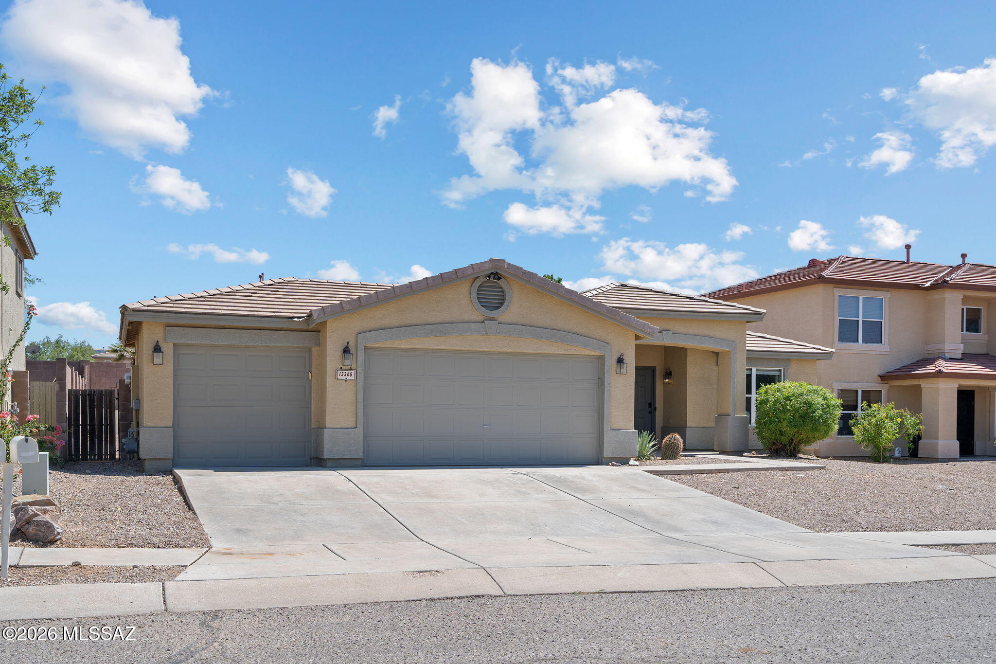 **Range Price! $399,999 - $425,000.** Move-in ready and meticulously maintained, this 5-bedroom, 2-bath home in the desirable Rancho Del Lago community offers 2,166 sq. ft. of comfortable living space. Fresh interior paint, an open-concept floor plan, and a spacious kitchen with a center island and stainless steel appliances create the perfect setting for everyday living and entertaining. The generous primary suite provides a private retreat, while the low-maintenance backyard features breathtaking Rincon Mountain views for relaxing or hosting guests. A rare 3-car garage with a pull-through bay offers convenient backyard access and exceptional versatility. This home is ready for you to move in and enjoy!