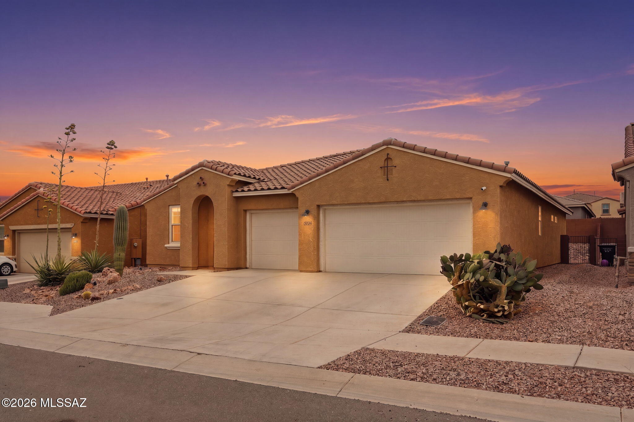 Beautiful 3 bed, 2 bath home with 1,928 Sq.Ft of living space + a flex room, can easily be converted into an office, playroom or another room for guests. This well maintained home was built in 2019 and has all the right upgrades in the right places. It has a 3-car garage, vaulted doors, granite countertops, gourmet kitchen with stainless steel LG and Whirlpool appliances, upgraded tiled walk-in master shower, epoxy coating on garage and back patio along with landscaped backyard. The current owner recently added an Aquasana Rhino Max Flow water filtration system for the whole house and fully owned not leased which will convey with the sale of the home. Beautiful location with nearby shopping, restaurants, community pool and park with mountain views of both Mnt. Lemmon & Rincon Mountains.