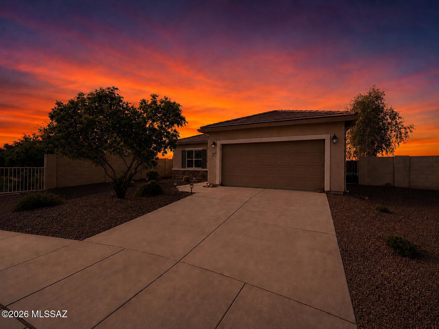 Mountain views featuring Picacho Peak from this lovely 3-bedroom, 2-bath home - Interior freshly painted! Has desirable split floor plan, spacious kitchen offering a large island, nice walk in pantry, and ample cabinetry, Perfect for everyday living and entertaining.  Soak in the scenery under the expansive covered patio, pre-wired for ceiling fans/lighting  Soak in the sun in the low-maintenance backyard w/attractive desert landscaping, and plenty of room to add a pool. Easy access to I-10, this home offers a quick commute to Casa Grande, Phoenix, and Tucson, making it ideal for commuters, full-time residents, snowbirds, or an investment property - HOA amenities include pool, water slides, basketball and volleyball courts, ball fields, full skate park, trails/playground-USDA loan Eligible