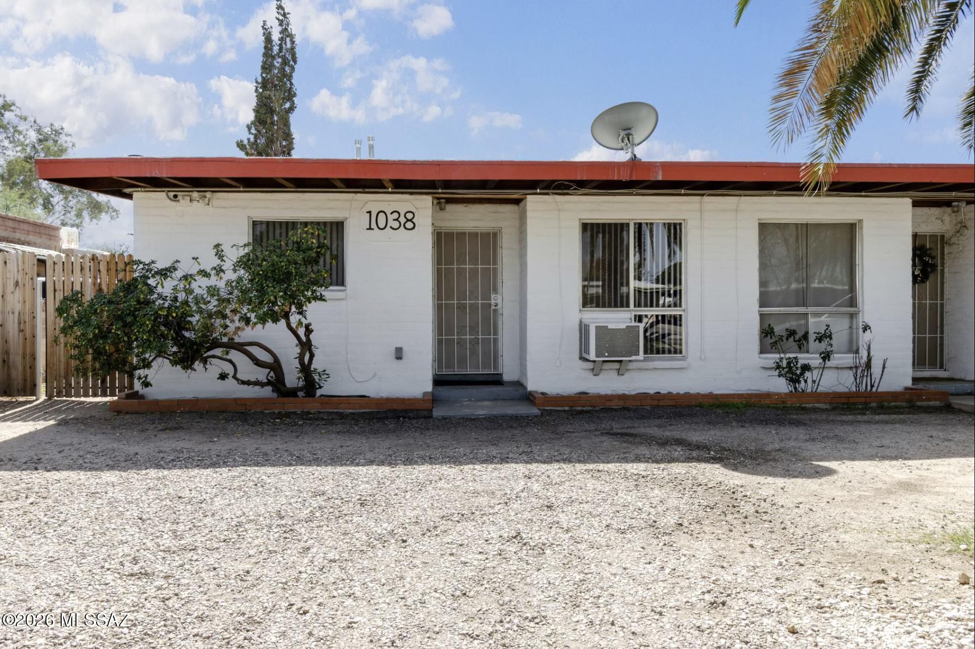 2 Bedroom 1.5 Bath Duplex with private dedicated pool. Ceramic tile floors throughout. High ceilings with beautiful wood beams, skylights bring in great light. New Central AC/heat system installed (back up wall units in living room and bedrooms). Large eat in kitchen with new ceramic tile, new refrigerator & dishwasher (stainless tub), new stove, garbage disposal. New water heater. New tile shower, newly reglazed bath tub, toilet and vanities. Laundry room has washer/dryer hook ups. Great back yard with private pool and BBQ ramada (Pool renovated with Pebble Fina finish in October 2025). Pool service included (tenant to skim, clear skimmer basket, brush down after storms/backwash, maintain water and check chemicals between services). Master Bedroom offers small enclosed patio with plant room. Two sliding glass doors open out to covered patio and back yard from master bedroom and kitchen. Parking is in front round about. This unit and entire property is NO smoking/NO vaping. Cats OK. Sorry no dogs. We would love to provide native plants for the yard if new tenant is willing to care for them.