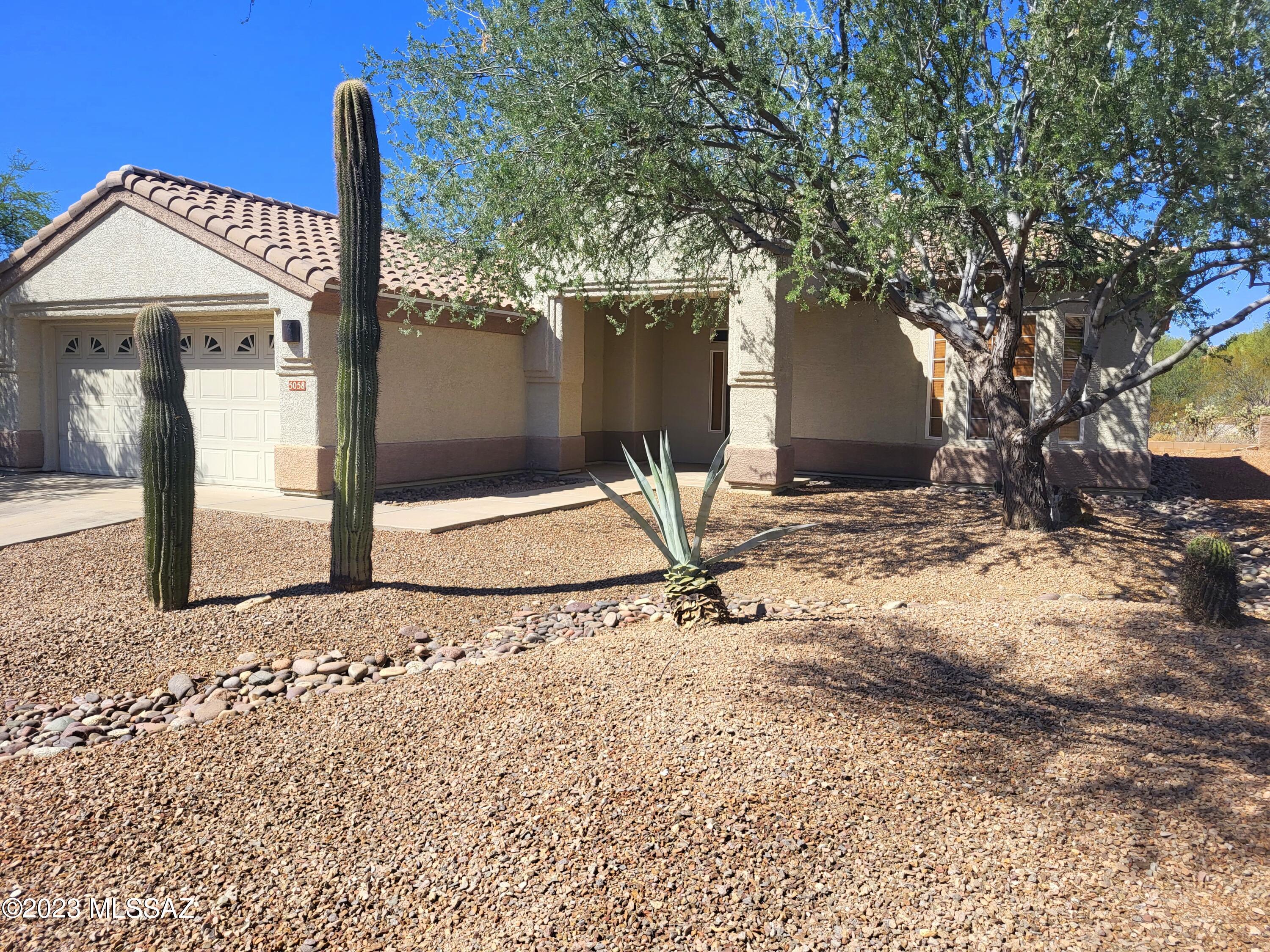 Don't miss this unique gem backing 8th Golf Green! Gently used - owner snowbirds resided during winters! Move-in ready home offers customized Coconino floor plan w/apx 1850 sqft. Generous owners' suite offers views, walk-in closet, Jacuzzi tub & separate shower. 2nd bedroom has walk-in closet & bay window for flexibility. Throughout, enjoy the easy care of large ceramic tile & extra light from high windows + oversized laundry. Your kitchen is a cooks' dream: plenty of workspace, gas stove, granite counters, & loads of cupboards. New roof 2022, all interior water piping redone & HW Heater valves 2025, updated lighting in bathrooms.  Relax in your backyard w/extended brick pavers, covered patio & lo-care landscaping. Relish the Dove Mtn lifestyle - easy access to HH amenities w/nearby paths