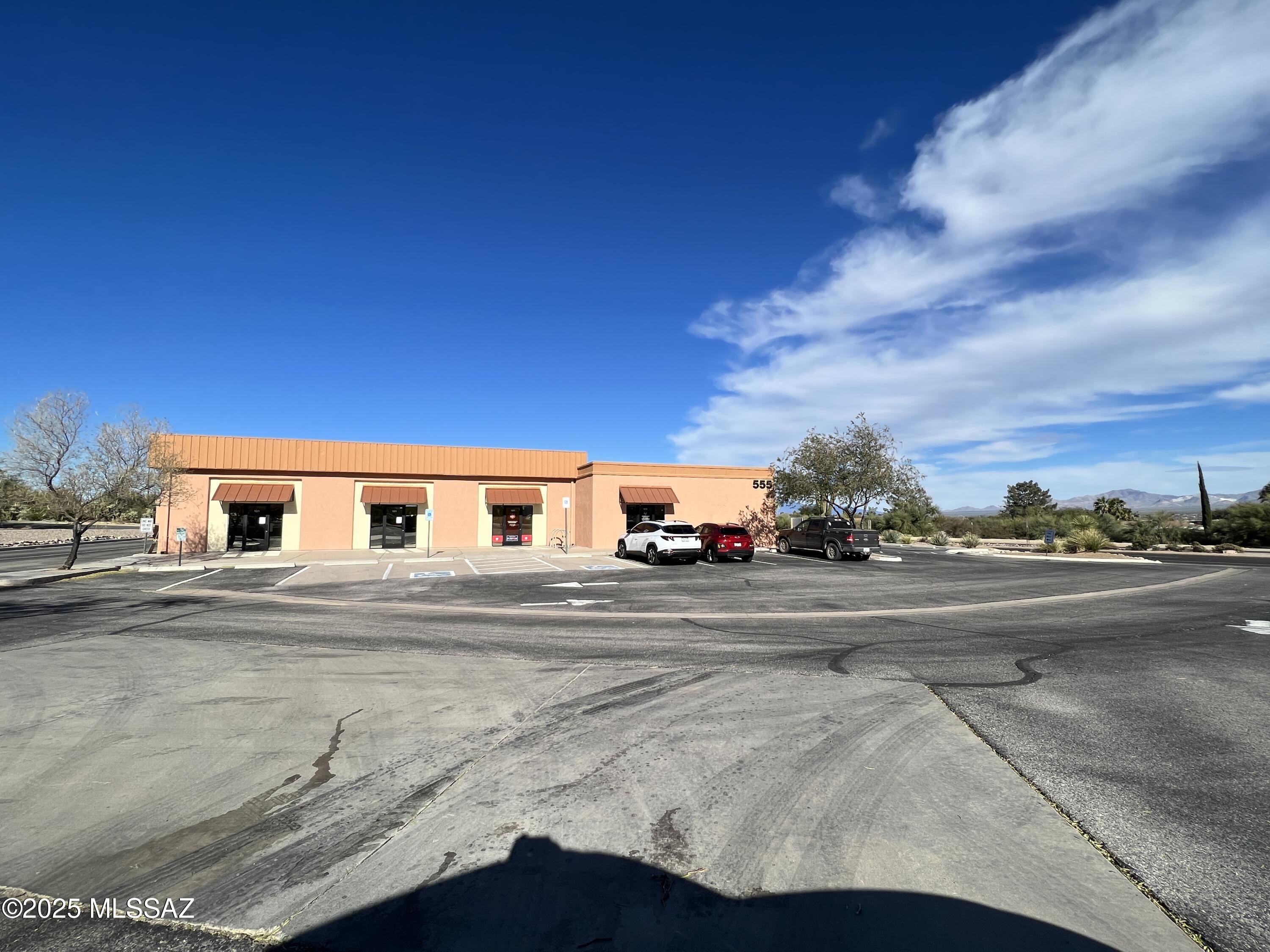 This fully leased landmark in Green Valley offers a rare investment opportunity with long-term community and professional tenants. Once the Green Valley Fire Station, it was completely redeveloped in 2013 with new HVAC, roof, plumbing, and electrical. The 6,220± SF building on 1.11 acres includes a drive-thru, ADA access, and ample paved parking. Tenants include The Salvation Army, Green Valley Council, RE/MAX Signature, and the Parkinson Support Group. Located next to the Pima County Government Center and Library, it provides strong visibility and steady demand. Net Operating Income: $97,000 | 6.9% Cap Rate | Turnkey and low maintenance! A standout property combining history, stability and lasting community impact.