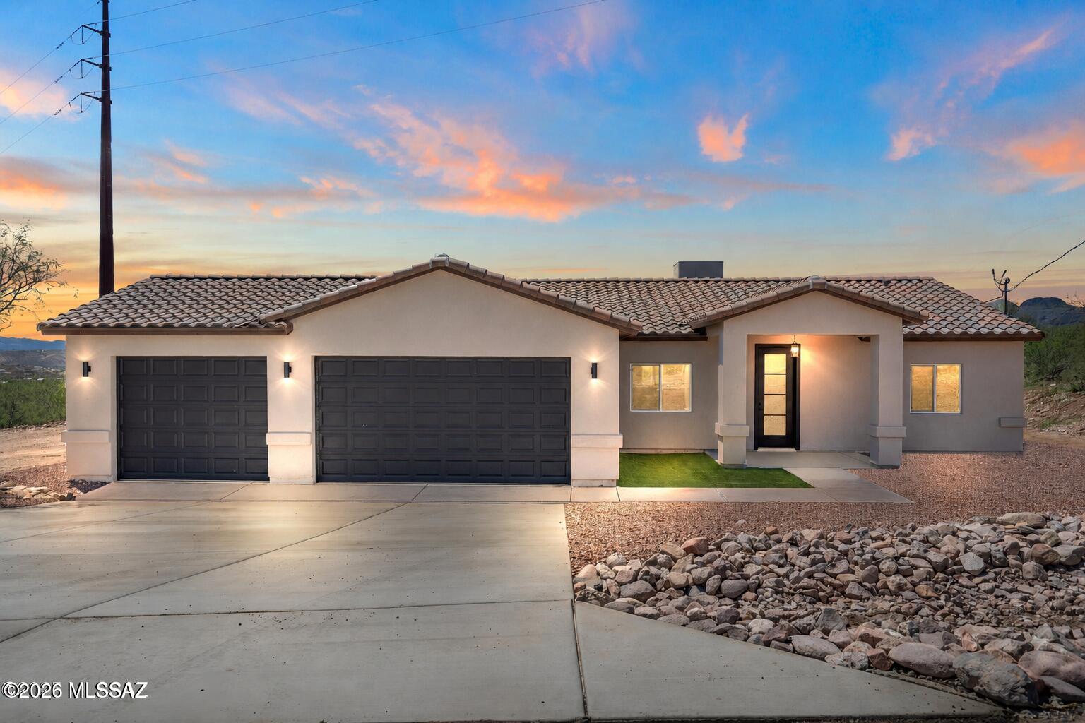 Home Under Construction - Photos Are of the Model Home; Actual Finishes May Vary. This beautiful new construction home offers 3 bedrooms, 2 bathrooms, and 1,563 sqft. with a bright, open floor plan. The kitchen features quartz countertops, a pot filler, and stylish finishes. Built with full insulation for enhanced energy efficiency and comfort, while the 3-car garage provides plenty of storage and parking. Enjoy amazing views and quality craftsmanship throughout.