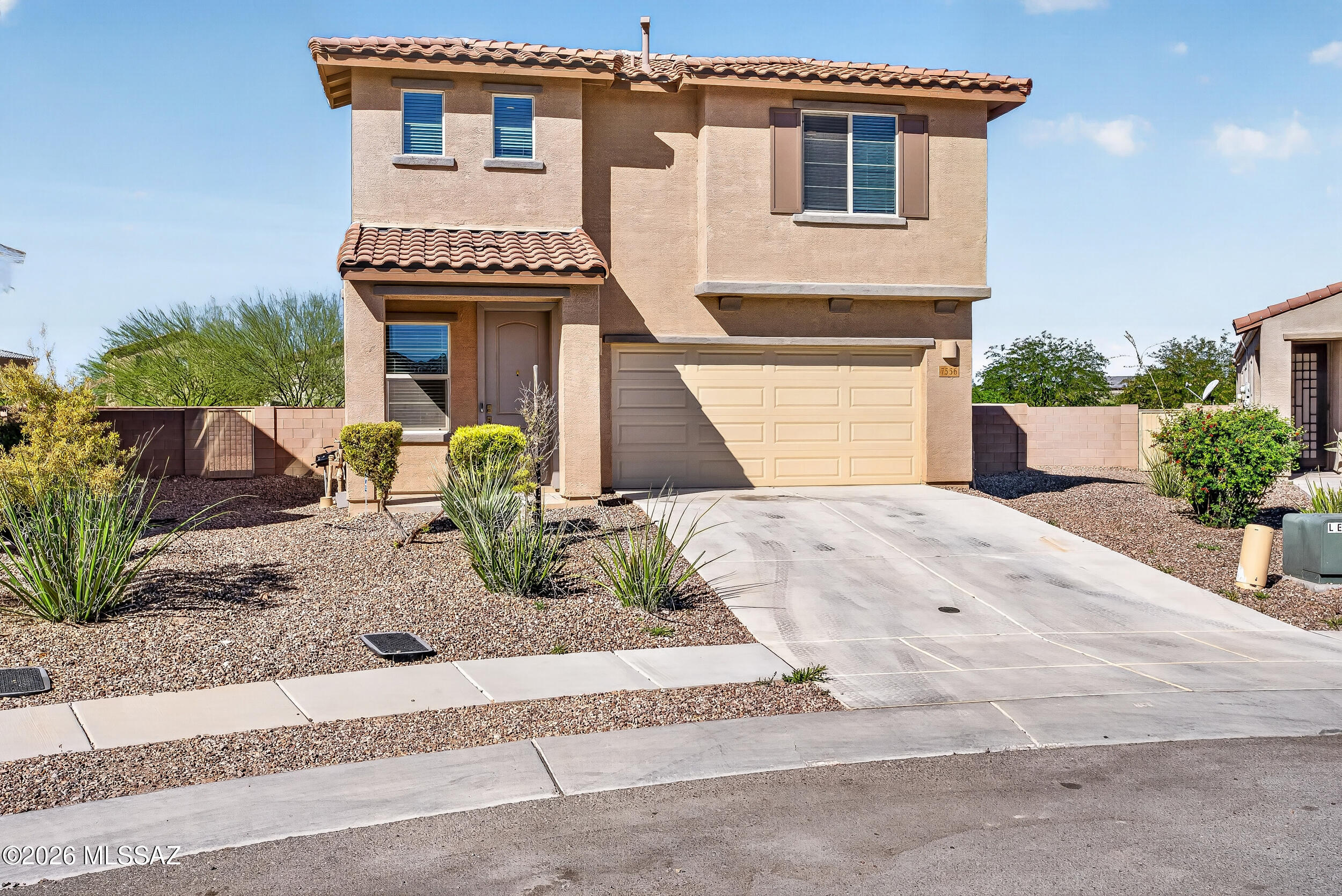 Incredible VA loan assumption @ 2.25% for qualified VA buyers!! Within the Vail School Dist, this beautiful home offers 2,070 sq ft of energy-efficient living. Featuring 3 bed/3 baths w/solar, no carpeting downstairs & fresh interior paint! The chef's kitchen boasts granite island w/breakfast bar & pendant lighting, dark espresso cabinets, gas range & walk-in pantry. Upstairs you'll find: an impressive owner's suite w/walk-in closet & luxurious bath w/dual vanity & walk-in shower; BRAND-NEW carpet in all bedrooms & the spacious loft; huge upstairs laundry w/tons of storage! Outside, enjoy an expansive low-maintenance backyard w/covered patio, extended pavers, artificial turf & no immediate rear neighbors. Community amenities: 2 pools, splashpad, pickleball & parks. Turnkey & move-in ready!