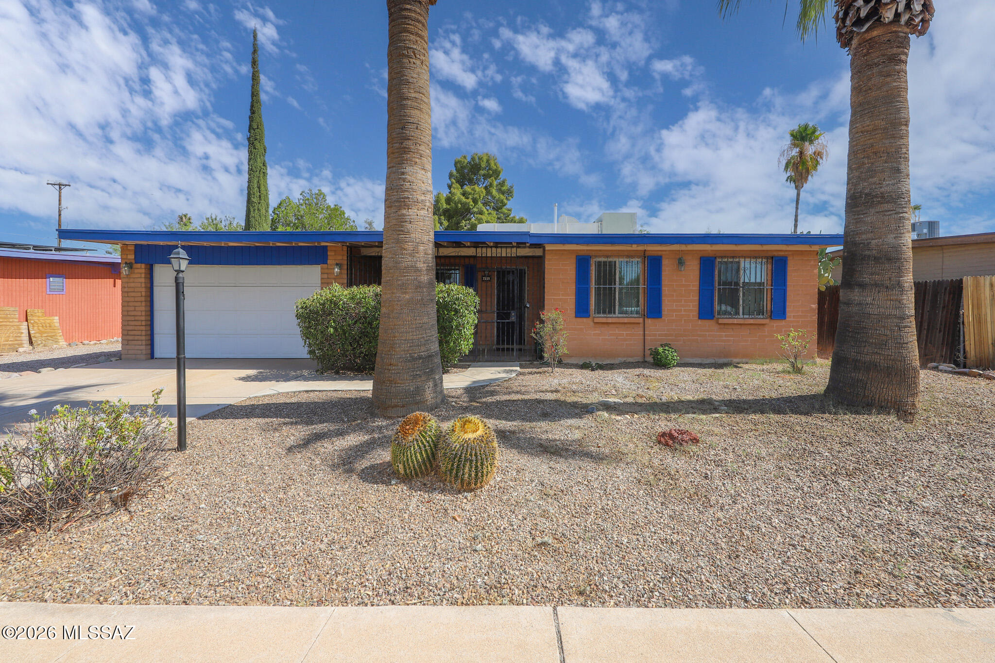Spacious 4-bedroom, 2-bath home on Tucson's desirable east side. This home features a large living area, solid wood cabinetry, updated windows and a functional floor plan. Enjoy the backyard with two patios, including an enclosed patio with a cozy fireplace. Perfect for year-round entertaining and relaxing.