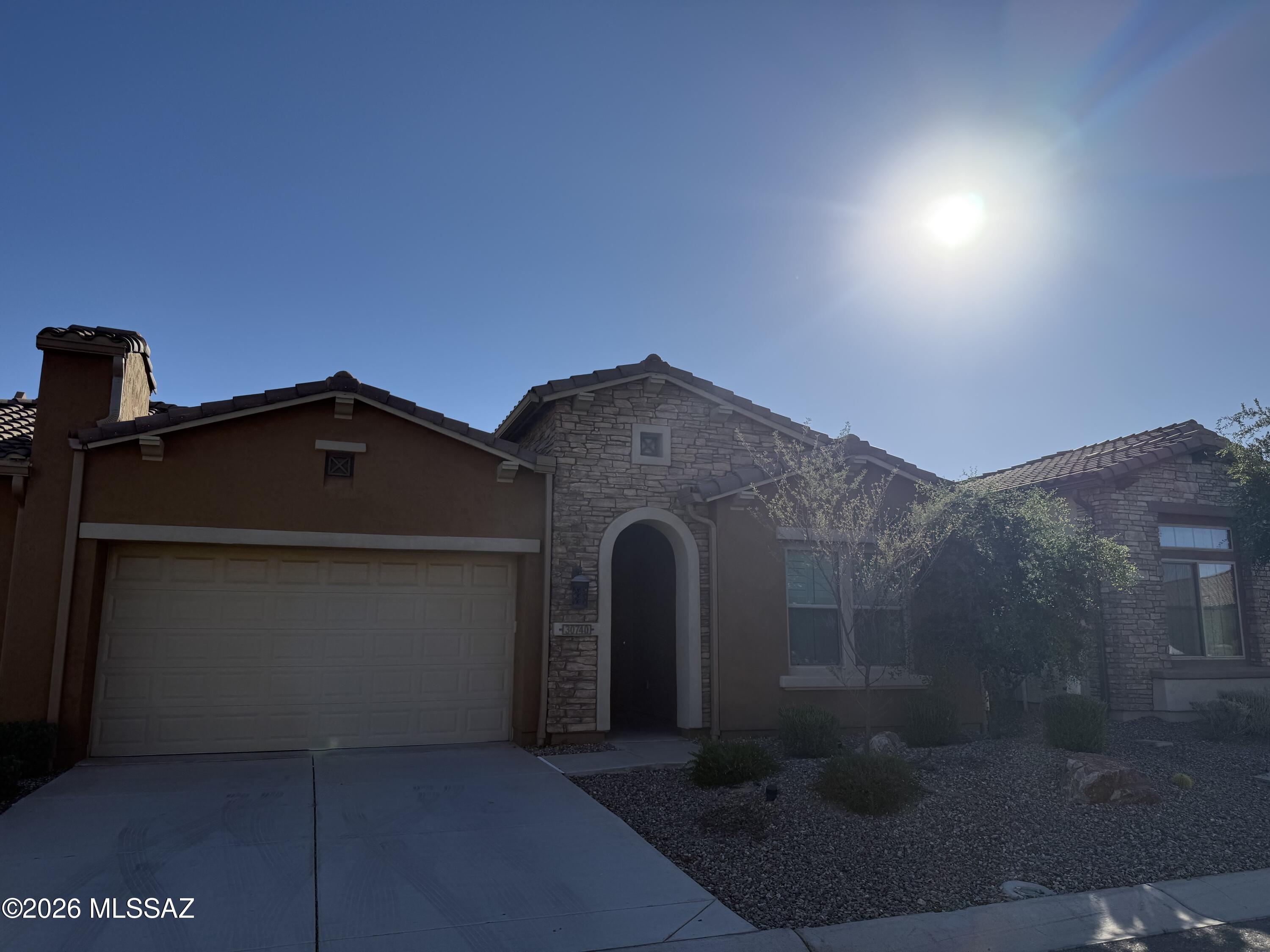 This is a beautiful 1707 Sq. Ft. Viva Villa Exterior Design __ built in 2020 that looks over a gorgeous Arroyo with a walking path.  This home includes 2-Bedroom En Suites, Great Room w/Media Alcove, Dining Area, Spacious Den, Grand Kitchen Island w/Walk-In Pantry, Optional Powder Room, Separate Laundry Room, 274 Sq. Ft. Covered Outdoor Living Space, Deel 2-Car Garage, 9' & 10' Ceilings, and a 214 Sq. Ft. Enclosed Private Courtyard with gate.  The buyer has the incredible option of buying this unit and the attached unit as both are owner by the same individual = truly an investor's dream!