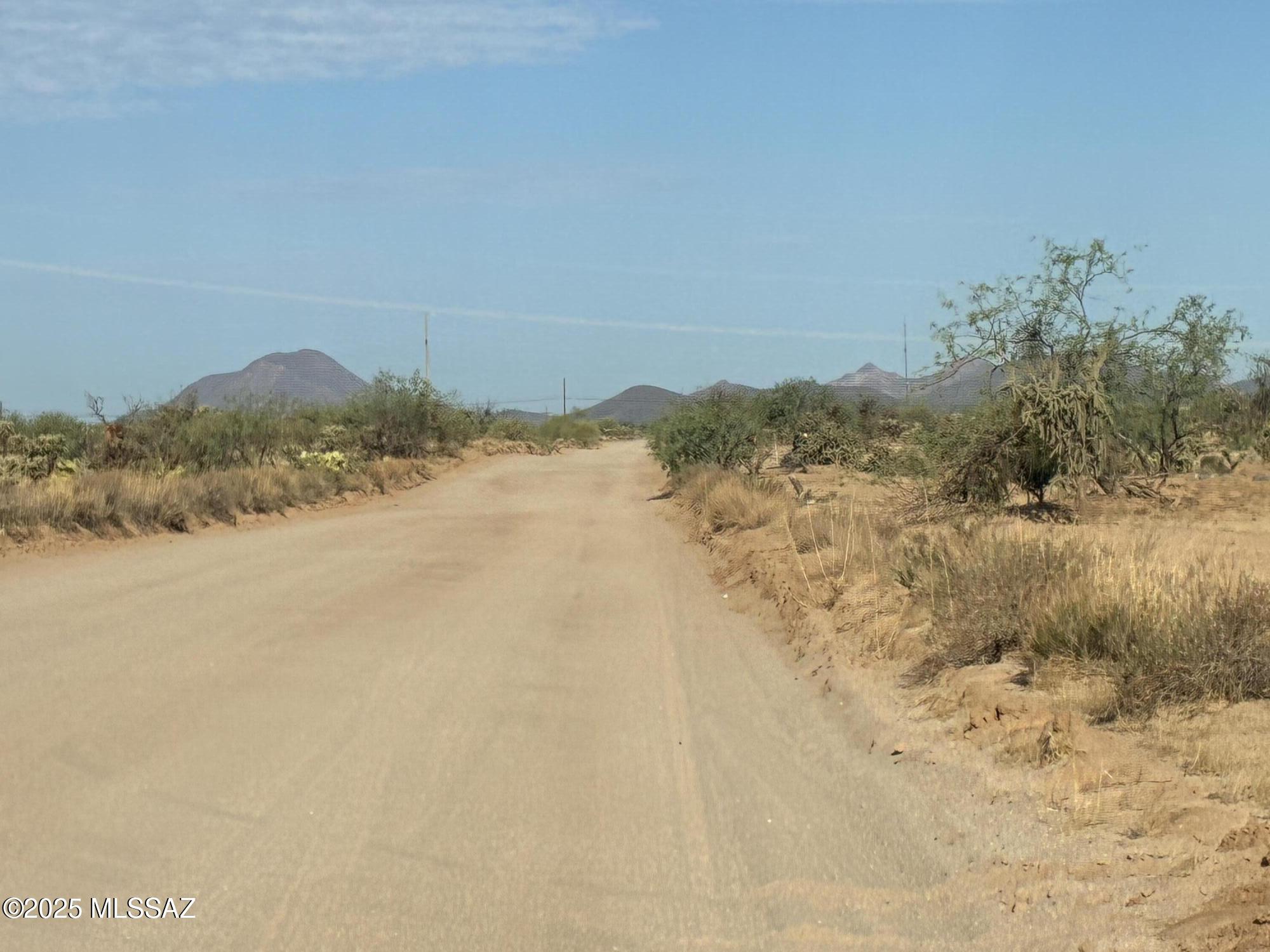 Level usable land with water and electric on the lot; in a quiet, peaceful area across the street from hundreds of acres of State land. Great for hiking or horseback riding! Owner/broker will carry with $7,500 down.  
Or for a Purchase Price of $53,000, owner will install septic and carry with $15,000 down.  
Additional lots available, see maps in documents.
Address has not yet been assigned.  Address shown is approximate.