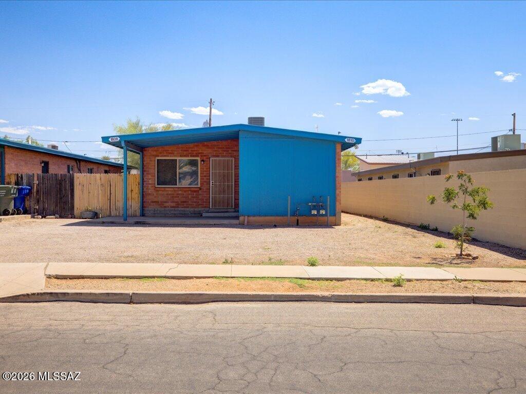 NEW LOWER PRICE! Charming duplex at 1808/1810 E Miles Street featuring two comfortable 2-bedroom, 1-bath units, each with a bright, open layout. The living spaces are inviting and practical, with functional kitchens and bedrooms that make it feel like home from the moment you walk in.

Each unit comes with its own washer and dryer, parking, and dedicated laundry area with storage space. Step outside and you'll also find private, fully fenced outdoor spaces for each unit, perfect for relaxing, pets, or a little outdoor setup of your own.

Whether you're looking to live in one unit and rent the other, or add a solid duplex to your portfolio, this one offers flexibility without sacrificing comfort. Buyer to verify all facts, figures, and measurements.