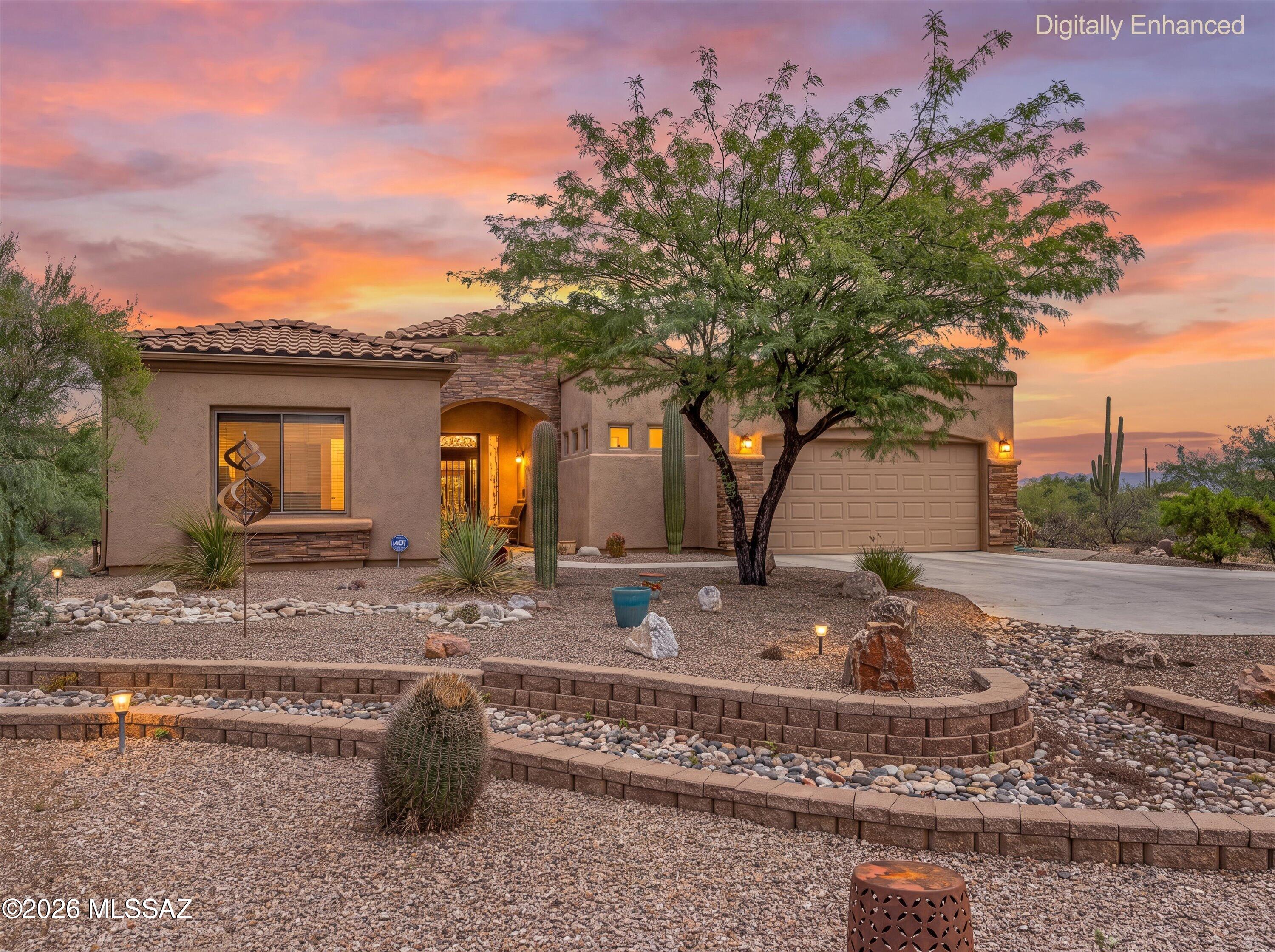 Discover this spacious semi-custom Sterling home in the desirable gated community of Tortolita Vistas, offering designer-quality details, beautiful mountain views, and the relaxed elegance of Southern Arizona living. From the attractive landscaped curb appeal to the thoughtful upgrades throughout, this spacious home offers comfort, style, and exceptional livability. The open living room and customized bonus room are designed to take full advantage of the unobstructed Tortolita Mountain vistas, making them perfect for entertaining or simply relaxing in a beautiful desert setting. The gourmet island kitchen features stainless appliances, including a gas cooktop, along with generous counter and cabinetry space and an easy flow to the Nook/Office.  The primary suite offers a peaceful retreat with mountain vistas, plus an en-suite bath complete with a walk-in shower, soaking tub, double vanity, and spacious walk-in closet. A secondary bedroom and bath, convenient Den that can serve as an additional bedroom, laundry room, and powder room complete the interior. Outside, the brick patio provides room for BBQing and dining, while artificial turf, natural desert landscaping, and a pergola create a comfortable outdoor living area for taking in the beautiful mountain views. Come see this special home and make it your own.