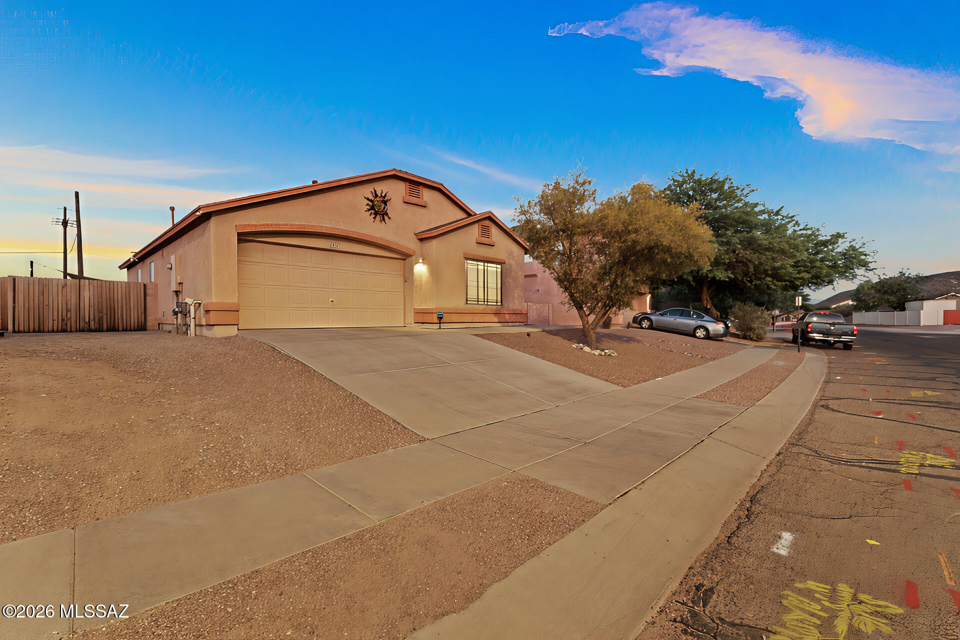 Desert sunsets, mountain views, and a clean single-level design give this Mission West Tucson home instant curb appeal. The photos hint at easy Arizona living with low-maintenance landscaping, a two-car garage, bright dining space, tall windows, and a backyard made for evenings under string lights, complete with covered patio space, seating areas, and just enough privacy to keep you curious.

Located in Tucson, AZ, Mission West offers access to local dining, shopping, desert recreation, Tucson Mountain Park, Saguaro National Park, and historic Mission San Xavier del Bac. What neighborhood events and seasonal happenings make this area even more inviting!

Call your agent today for a chance to be one of the 1st to see this house and see why this Tucson home for sale deserves a closer loo