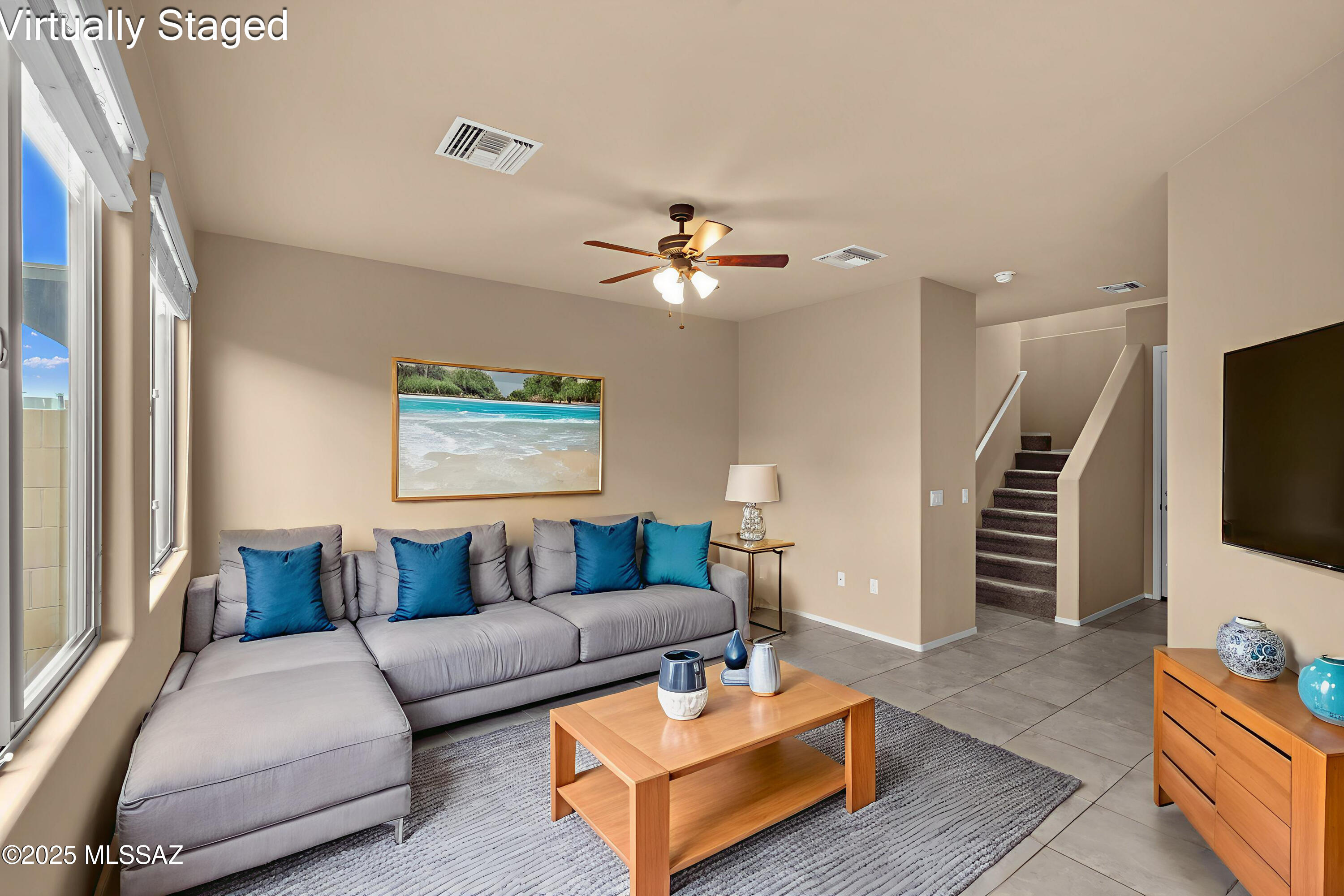 Freshly Painted!!!!Beautiful 3-Bed, 2.5-Bath Condo in Central Tucson! Welcome to this spacious condo offering 3 bedrooms and 2 bathrooms upstairs, with a half-bath downstairs along with a large great room and kitchen. Enjoy the convenience of low maintenance living with an HOA that covers exterior upkeep, including roof, exterior paint, and common area outdoor maintenance, giving you peace of mind year-round. The unit offers a comfortable layout perfect for everyday living or entertaining and features all-electric appliances for ease and efficiency.  With its convenient location near shopping, dining, and easy access to arterial roads, this condo is a wonderful opportunity to enjoy both comfort and convenience in the heart of Central Tucson.