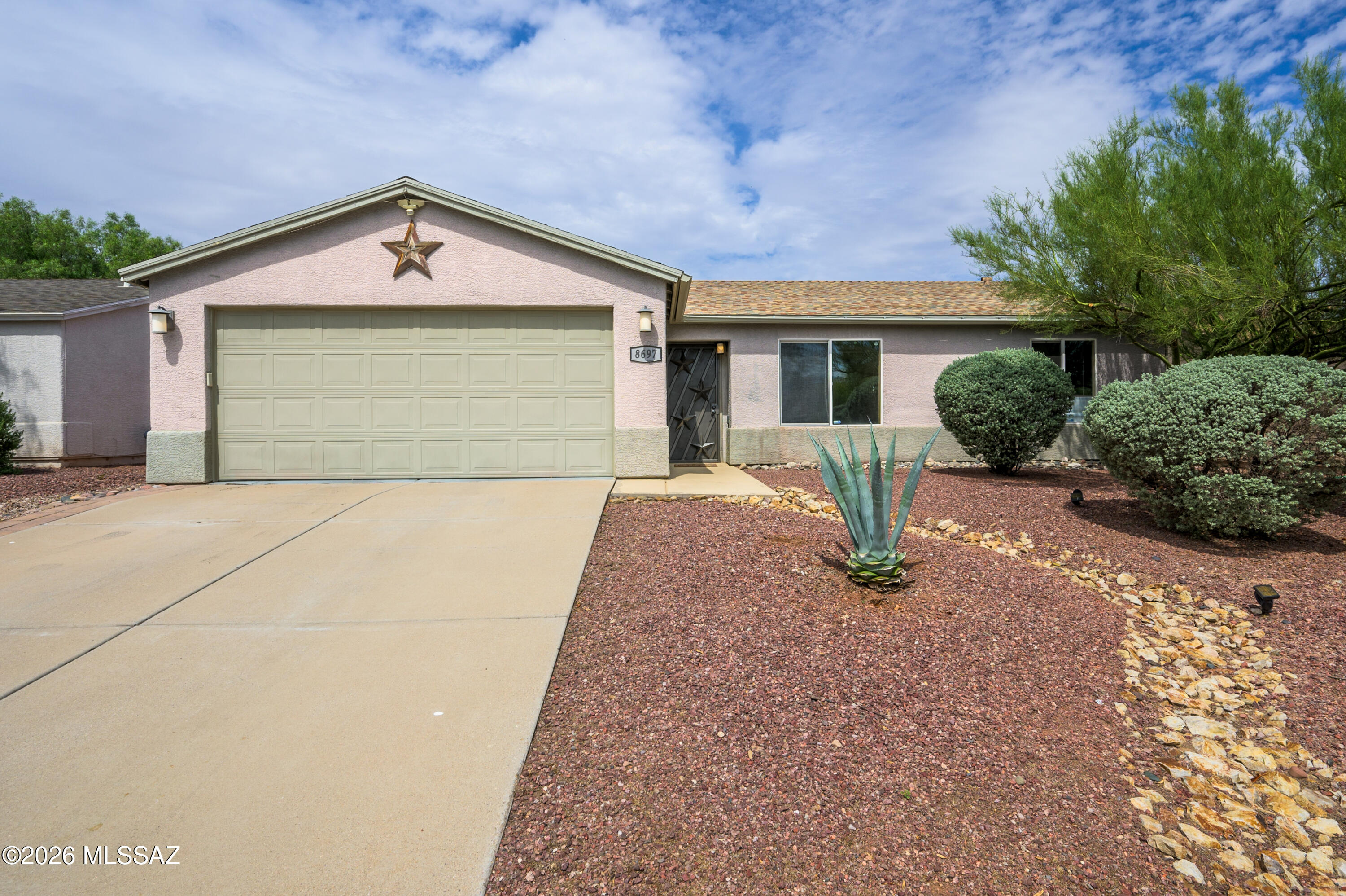 Welcome to this beautifully maintained 3-bedroom, 2-bathroom home located in the highly sought-after Silver Moon subdivision. Designed with a desirable split-bedroom floor plan, this home offers an ideal balance of privacy and open-concept living, creating a spacious and comfortable feel throughout.

The inviting living room features a one-of-a-kind pallet wood accent wall, adding warmth, texture, and character to the heart of the home. Both bathrooms are finished with granite countertops, and the oversized primary suite boasts a huge walk-in closet upgraded with abundant custom storage and organization.

Step outside to enjoy the oversized covered patio, offering plenty of shade and privacy for relaxing or entertaining. The expansive backyard is generously sized.
