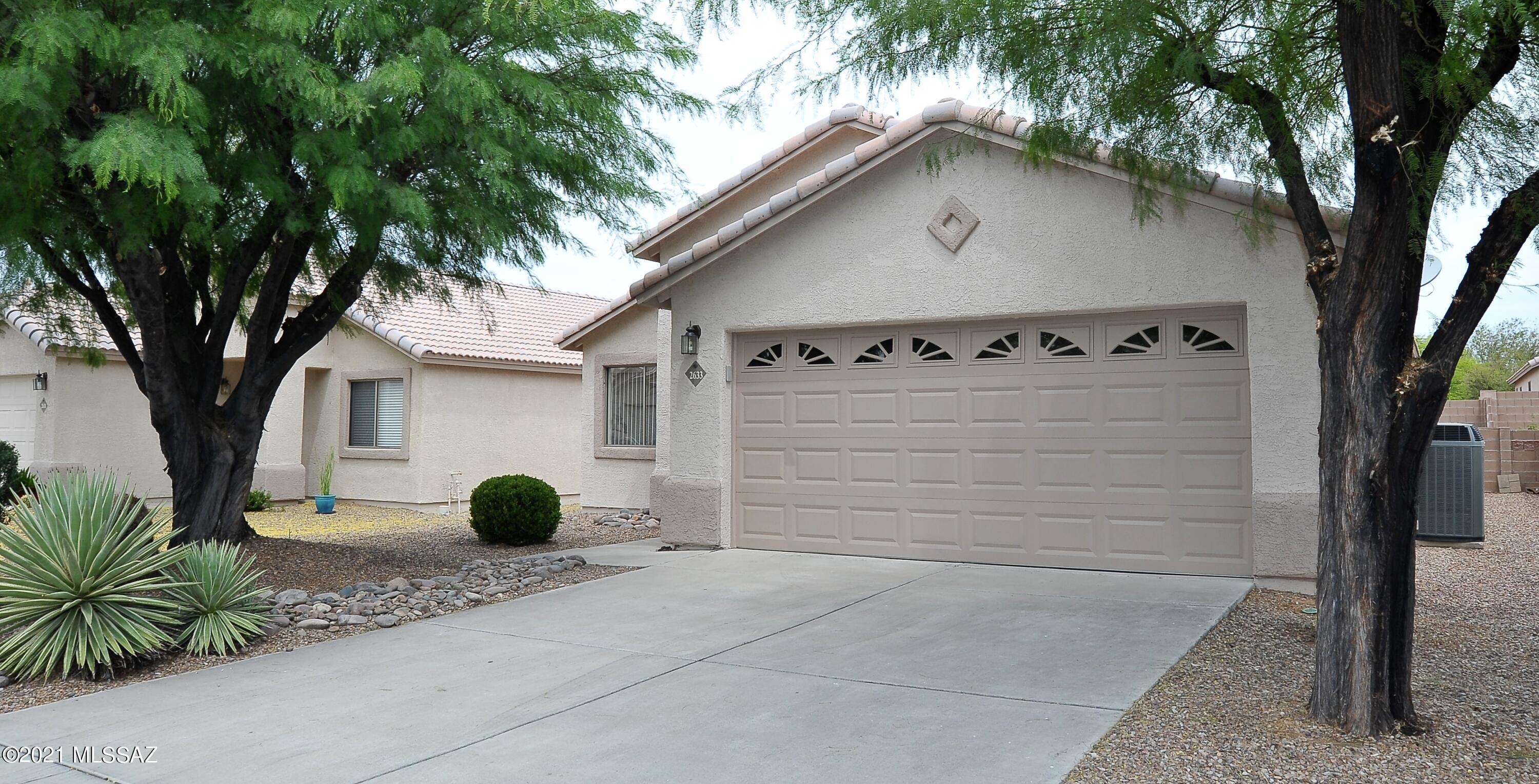 Don't miss this fresh and ready home in gated neighborhood with beautiful ceramic tile floroing throughout ... no carpet!  Well kept home and first time being rented. Granite in kitchen with stainless appliances.  Granite in both bathrooms.  Washer/dryer included. New ceiling fans throughout.  Newer AC and water heater. North/south orientation with north facing backyard. 2 car garage and tile roof.. Trash service included.  Sought-after subdivision in a great location, close to YMCA,Pima NW campus, parks, schools and easy  I-10 and much more!  Non-smoking home.  One year minimum lease - no short term leases. Call listing agent for additional leasing requirements.