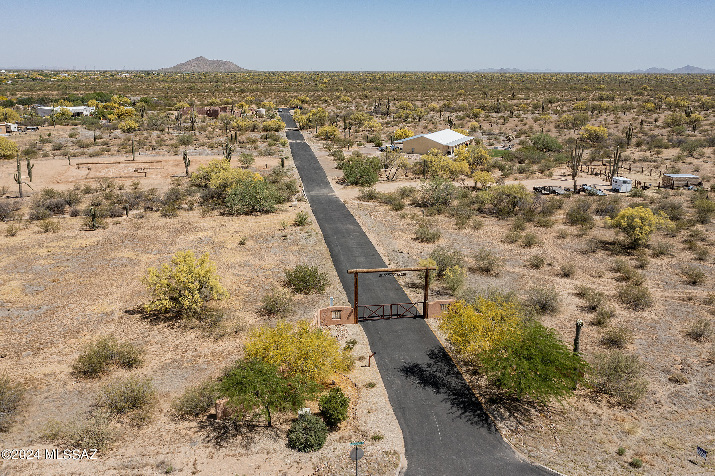 This is great opportunity for someone looking to build their dream home in a serene and peaceful environment. Located in a gated community provides an added sense of security and exclusivity.State Land on two sides of the lot is also a great advantage, as it can provide additional privacy. The availability of water(shared well) and power to the lot line is also a significant plus. Area of custom homes. A community that only allows site-built homes is another positive feature, as it can help ensure that the neighbors maintain its high aesthetic standards. Spectacular views, offering a panorama of some of Arizona's most iconic mountain ranges. Great views of the Owl Heads Buttes, Tortolita, and Santa Catalina Mts, and Picacho Peak. Horses allowed. Seller will consider a carryback.
