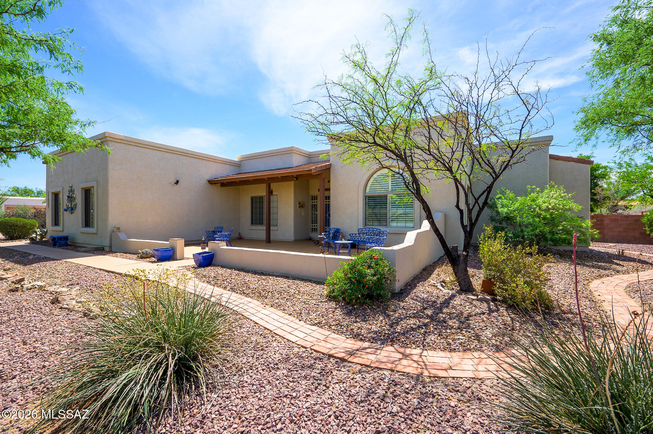 Immaculate home on nearly an acre in the desirable Antler Crest neighborhood! Enjoy peaceful desert living with plenty of space, privacy and room to grow. This well-maintained home is move-in ready, featuring a comfortable split floor-plan, 2-car garage with workshop, and Murphy bed in guest room.  The spacious backyard offers quiet areas to relax or entertain, featuring a waterfall, 14x14 storeroom and plenty of space for a pool or custom outdoor retreat. Home has been exceptionally well-cared for, with newer HVAC & water heater (2022), and 50 year epoxy/silicone roof coating. Located in the award-winning Vail School District and close to shopping & dining, w/easy access to DMAFB, Raytheon, and downtown Tucson, this home truly has it all!