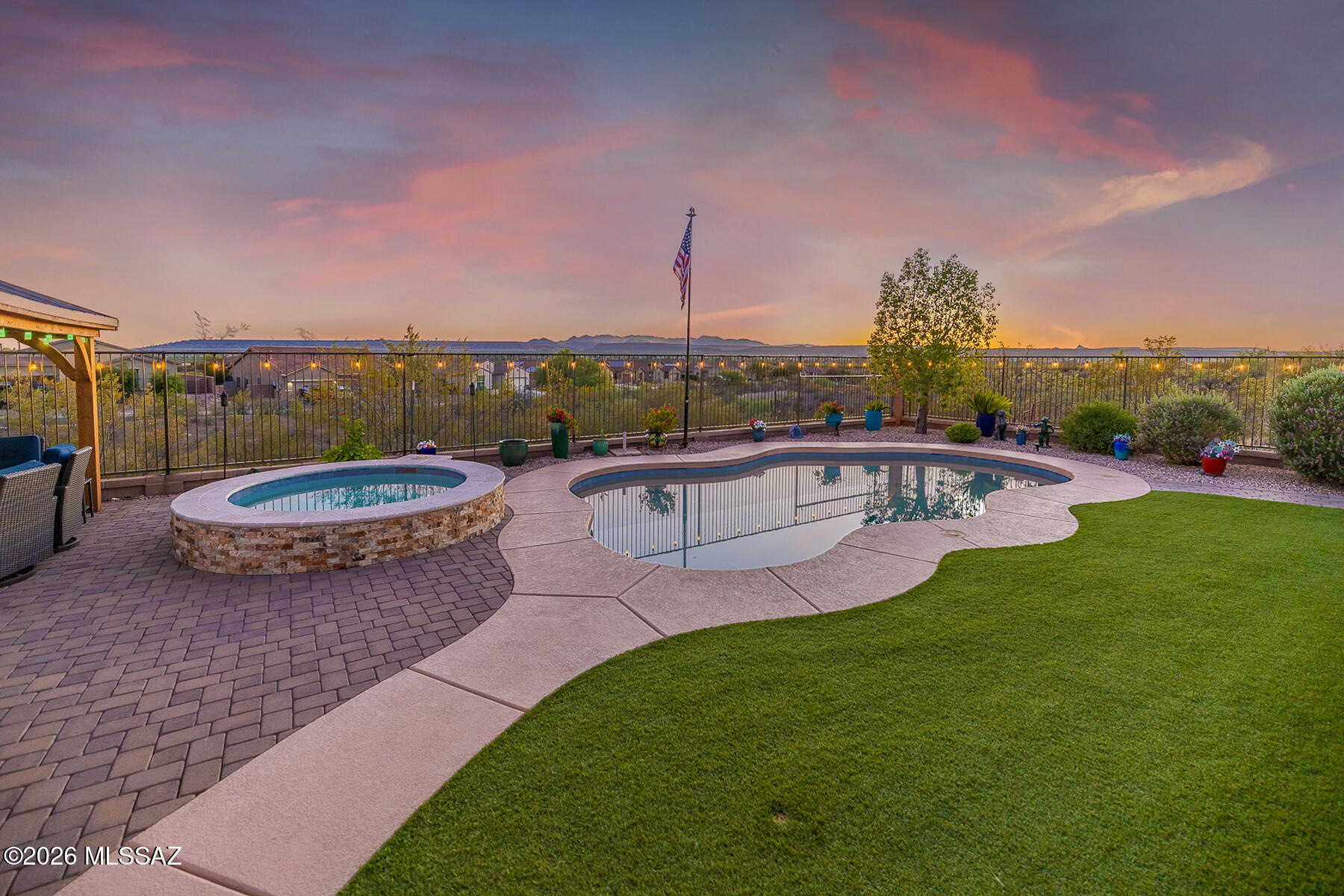 Nestled within the Encore gated community of Madera Highlands Village, this exceptional solar powered home offers captivating views with a breathtaking backdrop from nearly every angle. A thoughtfully designed great room floor plan with decorative ceiling soffits that define the living spaces. Spacious kitchen with center island, breakfast bar, stainless steel appliances, granite countertops & abundant cabinet space. The kitchen flows seamlessly into the main living & dining areas, creating a bright & inviting atmosphere. The primary suite includes a private ensuite bath with his/hers vanities, soaking tub, walk-in shower & closet. Step outside to experience the resort style backyard with covered patio, pool, spa, fire pit & gazebo while soaking up the incredible Mountain & Sunset Views!