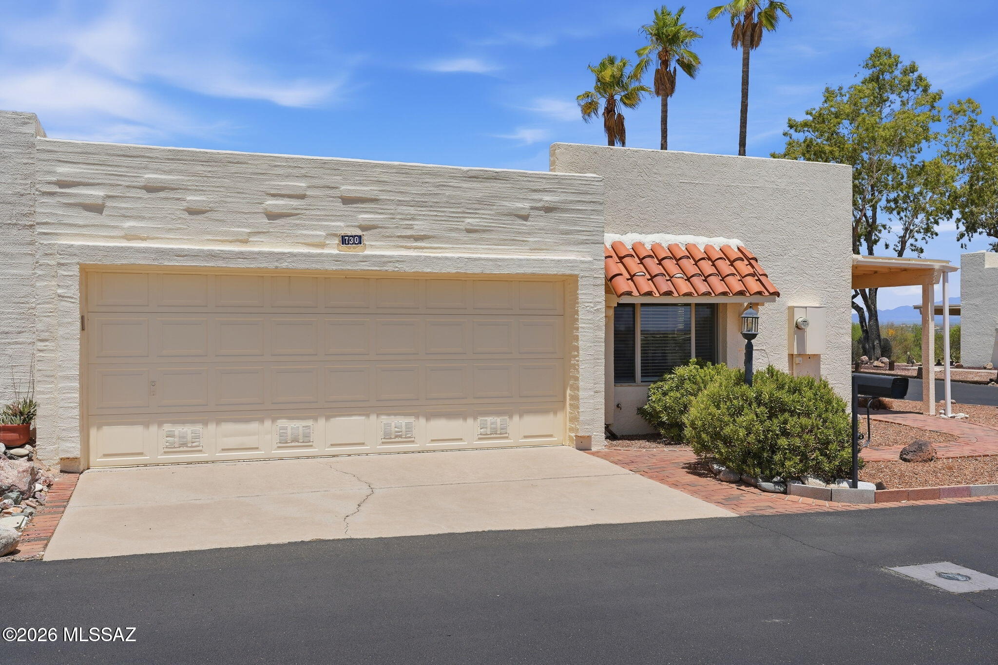 Golf and Mountain Views located in the GVR. Beautifully maintained, 3BD/2BA home Valley, AZ. Desert Hills 2, bright and open with a functional open layout - perfect for everyday living and entertaining with a really nice centrally located atrium.  Enjoy 1793 sq ft with an additional heated and cooled Arizona Room. Enjoy a great backyard overlooking Hole 3 of Desert Hills. Low-care yard. Newer Windows and a Prime location near everything Green Valley has to offer. Come see today!