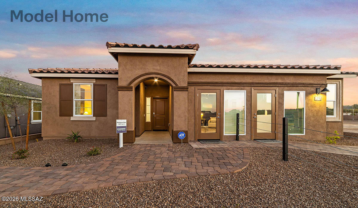 Welcome to the popular Mariposa floor plan, offering 1,897 sq.ft. of thoughtfully designed living space. This single-story home features 4 bedrooms, 3 bathrooms, including a private primary suite and a secondary bedroom- both with their own full baths, perfect for guests or multigenerational living.  The open concept layout flows seamlessly from the kitchen to the dining and living areas, ideal for everyday living and entertaining. Located in the highly desirable Rancho Sahuarita community, residents enjoy resort-like amenities, including multiple pools and splash pads, 10-acre lake, recreation centers, fitness facility, pickeball and basketball courts, walking trails, and the popular Safari Park!