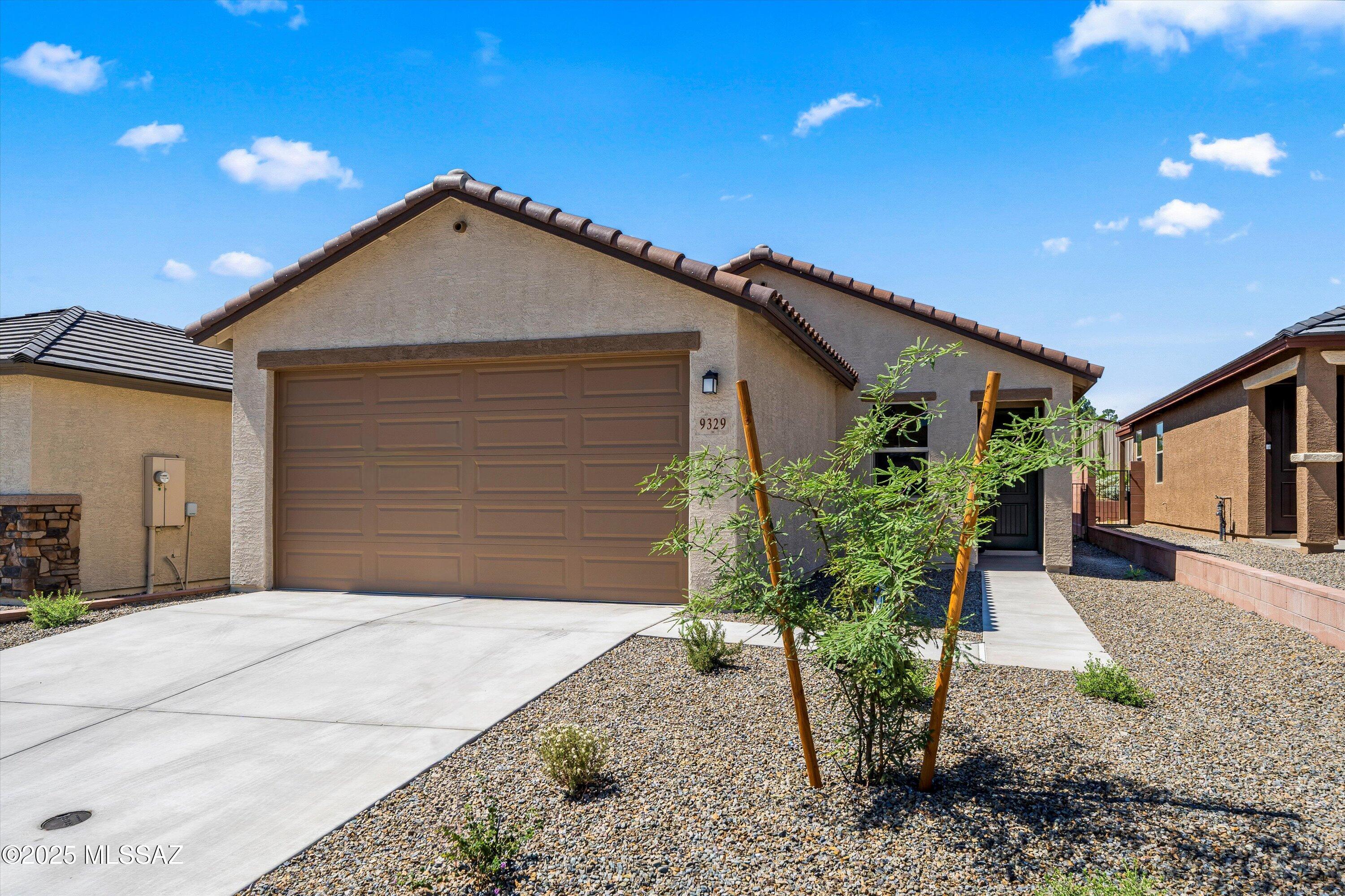 BUILT AUGUST 2025 - Gorgeous mountain and sunset views. Backyard opens to the desert without rear neighbor. This beautiful 3-bed 2-bath single-story home features 9-ft. ceilings, double car garage and glazed porcelain tile throughout. Split floorplan. The kitchen showcases white shaker cabinets, granite countertops and Whirlpool® stainless steel appliances. The primary suite features a walk-in closet and en-suite bathroom with an extended dual-sink vanity and full shower. The covered patio offers shade for outdoor living.