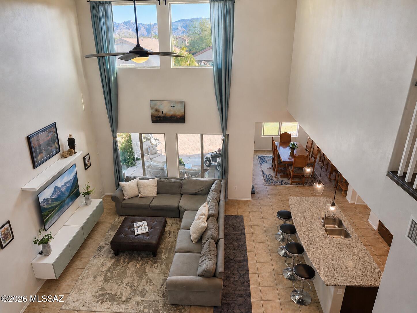 Fabulous and functional floorplan offering 5 bedrooms, including a spacious primary suite downstairs along with an additional bedroom and private office/den on the main level. This well-designed 2,880 SF Sierra Morado home lives large with an open great room concept plus an expansive upstairs loft perfect for a playroom, TV room, or additional living space.  2 new AC units in 2024

The upgraded kitchen features stainless steel appliances, granite countertops, oversized island, custom tile backsplash, pantry, wood cabinetry, and pendant lighting. The primary suite includes a relaxing garden tub, walk-in shower, dual sinks, and executive-height vanity. Additional highlights include soaring ceilings, Jack & Jill bath upstairs, tile flooring throughout the main living areas. Step outside to a beautifully landscaped backyard with covered patio, pavers, grass, raised garden bed, hot tub and pergola, grape vines, and a lemon tree. The community offers a clubhouse with pool, basketball courts, playgrounds, pocket parks, dog park, and miles of walking trails. A rare opportunity combining space, flexibility, and lifestyle in Sierra Morado!
Refrigerator, washer and dryer do not convey. 
Listing agent is an immediate family member of seller.