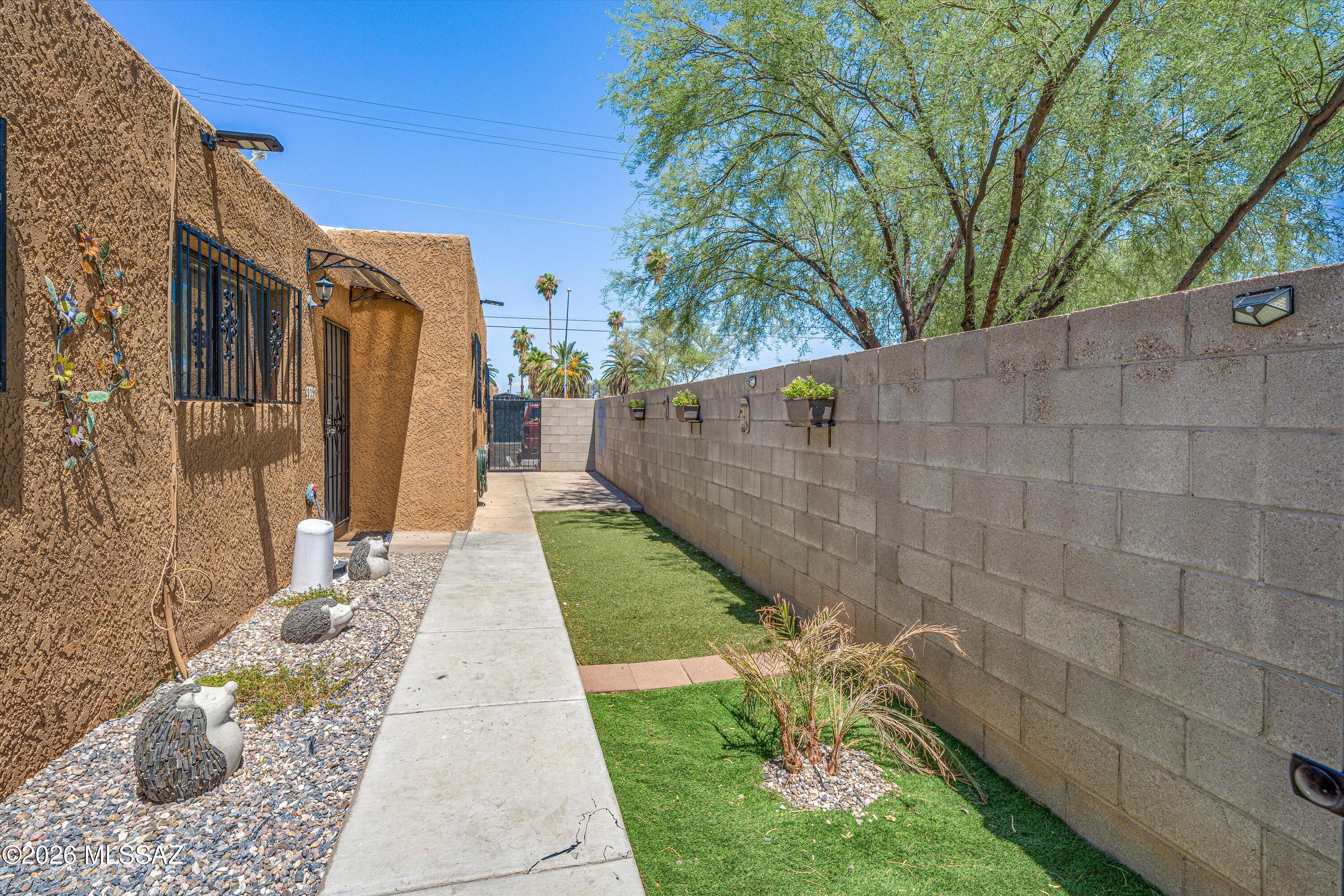Investment opportunity with immediate upside! This well-maintained fourplex features updated interiors with tile flooring throughout, remodeled bathrooms, fresh neutral finishes, and spacious floor plans designed for easy maintenance. One unit is currently vacant, providing an excellent opportunity for owner-occupants, house hackers, or investors looking to lease at current market rents. The property offers gated access, covered parking, and low-maintenance landscaping. Professional financials, rent roll, and operating expenses available. Whether you're looking to expand your portfolio or live in one unit while the others help offset your mortgage, this property offers flexibility, strong income potential, and room for future growth.