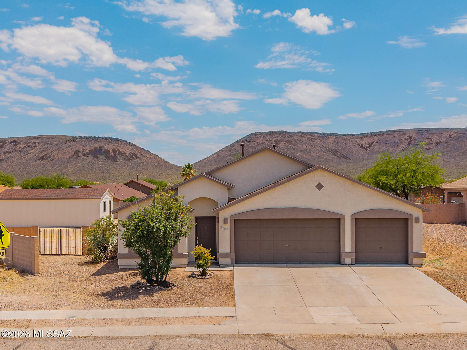 Discover this Southwest gem in one of Tucson's fastest-growing areas! Situated on one of the largest lots in the neighborhood, this beautifully remodeled 4-bedroom, 2-bath home offers the perfect blend of style, comfort, and space. Inside, you'll find a turnkey interior with modern finishes, an open and inviting layout, and thoughtful updates throughout. The expansive backyard provides endless possibilities for entertaining, relaxing, or creating your dream outdoor retreat. Conveniently located near shopping, dining, schools, and easy freeway access, this move-in-ready home is a rare opportunity to own a beautifully updated property on an oversized lot in booming Southwest Tucson