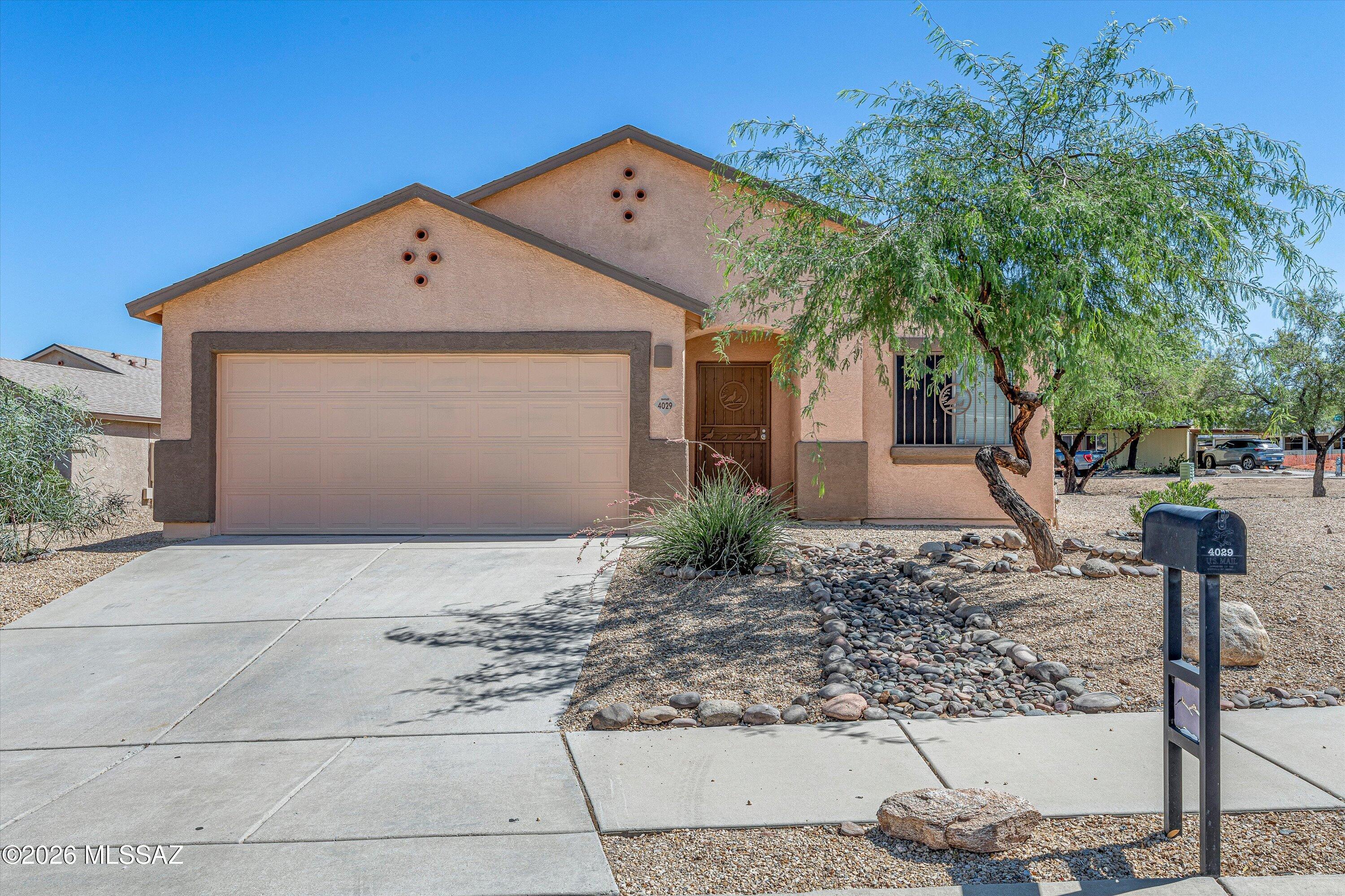 RED, WHITE & BLUE RIBBON HOME! 4BR Plus DEN! LARGEST LOT in Desert Point Est! Corner w/Common Area! Centrally located& shielded from busy roads. NO 2-Story neighbors! Ceramic tile & Plank thru-out! Chill to your liking! New HVAC. Fresh Paint &New Water Heater! Updated faucets, lights &fans! Convenience defines the locale: Walk to Desert View HS. Hop in the car, zip over to Alvernon/Valencia for EZ-quick access to everywhere! Imagine special meals prepared in a Stylish Kitchen: SS Farm Sink, Granite Slab counters w/breakfast bar - open to the living space! Defined Dining off the kitchen! Enjoy fresh breezes day or night w/wrought iron window covers. Long Driveway for More Parking! Finished, North-facing Yard! FULL-LENGTH COV PATIO, paver extension& turf. Ready for pets, play & RELAXATION!