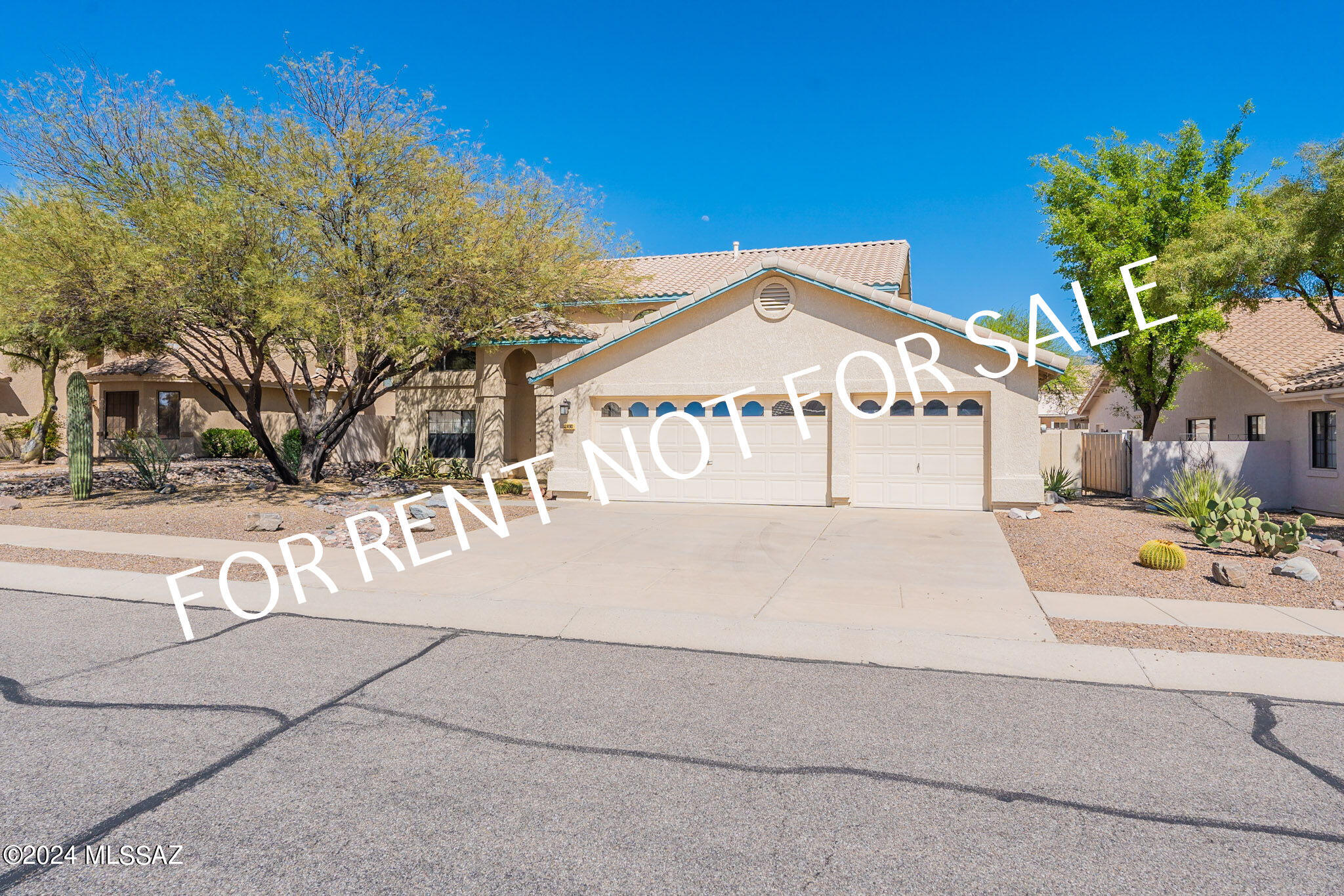AVAILABLE 06/22/2026 Built 1992 4 BED 2.5 BATH 3 CAR GARAGE 3209 sq.ft located in the highly desirable Rancho Vistoso Neighborhood in Oro Valley. As you enter the property, you will immediately notice high ceilings and an inviting atmosphere. Property features inviting entryway that leads to an elegant formal living and dining room. Open and airy floor plan. Elegant double doors lead to a convenient downstairs office/den. Cozy family room with gas or wood burning fireplace. Light and bright kitchen, breakfast bar, tiled island and counter tops, recess light under cabinets, walk-in pantry. Appliances included: refrigerator, electric stove/oven, dishwasher, built-in-microwave, washer / dryer AS IS [owner will not repair or replace]. Grand wooden staircase leading to a spacious loft, three guest bedrooms and guest bathroom with double sink vanity. Balcony off of upstairs guest bedroom runs the length of the home. Spacious master bedroom with huge decorative window, double sink vanity, garden tub and new remodeled walk-in shower, walk in closet. Landscaped backyard features stunning mountain views, sparkling swimming pool with diving board, gas fire pit. Weekly Pool Service Included.  Pets are subject to approval- Only 1 cat or 1 small dog. 

**Please visit our website for SECURITY DEPOSIT AMOUNT AND OTHER FEES.*