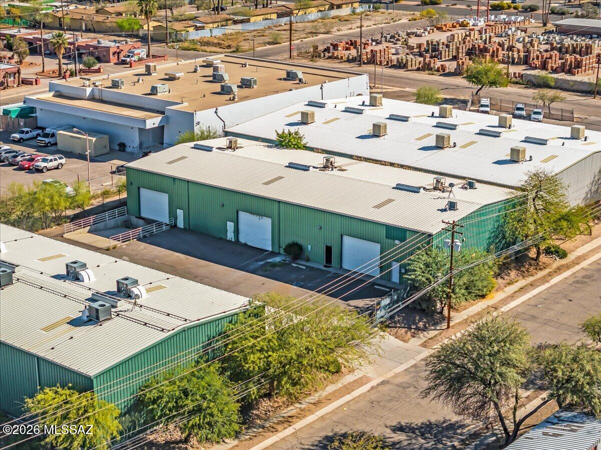 Prime Tucson Industrial Opportunity with Income & Flexibility! Excellent chance to acquire a versatile warehouse property situated on approximately 0.757 acres with C-2 zoning, offering both immediate rental income and additional value-add or owner-user potential. The property features 18 ft ceilings, 2 steel-constructed warehouse buildings with corrugated metal construction designed for durability and functional industrial use. One building totaling approximately 7,561 sq ft is tenant-occupied generating $4,800/month in rental income, providing built-in cash flow from day one. The second building totaling approximately 8,400 sq ft is currently vacant, creating an outstanding opportunity for an owner-user, expansion of the existing tenant, or additional lease income. Each warehouse includes: Four private offices. Two bathrooms. Kitchenette/break area. Large open warehouse space. Multiple mini-split systems providing heating and cooling in office areas. Commercial air conditioning serving the warehouse areas. 
The flexible layout supports a wide variety of commercial, industrial, training, distribution, or service-based uses allowed under C-2 zoning.
Conveniently located in Tucson with excellent accessibility, this property combines stable income, functional build-out, and future upside, making it ideal for investors, business owners, or portfolio expansion.