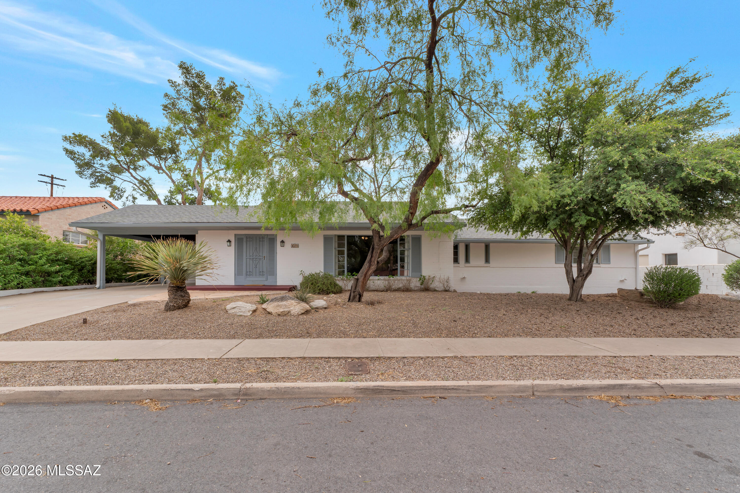 Welcome Home to this timeless residence in the historic Sam Hughes Neighborhood. Enjoy the convenience of being just minutes from local coffee shops, restaurants, boutiques, and grocery stores. The expansive backyard offers plenty of space to relax, entertain, or create your own outdoor oasis. Inside, you'll find light filled spaces, beautifully renovated bathrooms, and an updated kitchen featuring dual gas cooktops and ovens, granite countertops, and spacious maple cabinetry.  Major upgrades provide peace of mind, including a newer roof(Jan 2024), a sewer re-plumb Nov 2024 & exterior painted Feb 2024. Interior painted July 2026. The decorative fireplace conveys as is, adding charm and character to this exceptional home. Don't miss the opportunity to own a piece of Sam Hughes history.