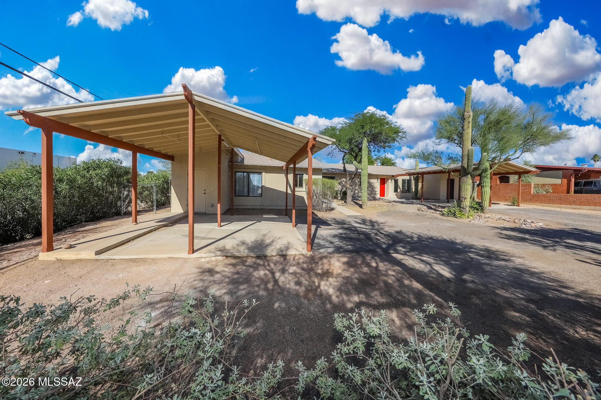 Turn-key Central Tucson duplex opportunity! This fully remodeled property features a spacious 4 bed, 2.5 bath main home plus a large 2 bed, 1 bath guest house -- both separately metered with private parking, offering incredible flexibility for multi-generational living, rental income, or owner-occupant opportunities. Thoughtfully updated with new flooring, fresh paint, stylish cabinetry, and modern countertops throughout. Ideally located near major hospitals, businesses, shopping, dining, and popular Tucson amenities, making this a prime investment in one of Tucson's most convenient locations. Agent/Owner.