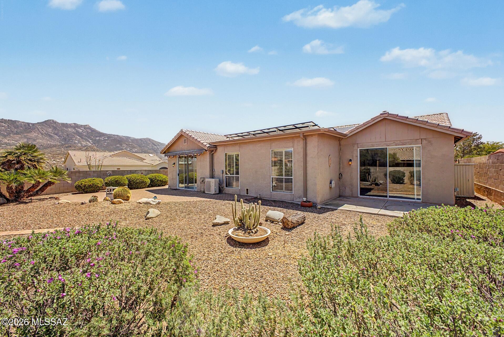 Elevated desert living in SaddleBrooke! Tucked on a quiet cul-de-sac with stunning mountain views, this spacious home blends comfort and style. Enjoy a bright, open layout with vaulted ceilings, abundant natural light, fresh interior paint, new laminate flooring in the Family room, and new carpeting in all carpeted rooms. The updated kitchen features granite countertops, stainless steel appliances, a large island with breakfast bar, plus Spring 2024 installations of the gas oven/stove, refrigerator, and water softener. The expansive family room includes a built-in bar and opens to a private backyard patio. A dedicated office adds flexibility. The serene primary suite offers outdoor access, dual closets, and a private ensuite. Complete with a 3-car garage and mature landscaping. Tour today!