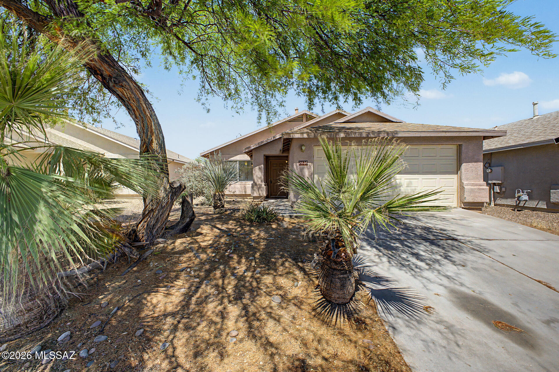 Investor Special! Unlock the possibilities! 3 beds, 2 baths, & a 2-car garage. Bursting with potential and ready for a fresh vision, this home offers a functional layout, solid bones, and endless opportunities to make it truly your own. A formal living room welcomes you inside, while tons of natural light fill the interior. Exposed concrete flooring offers a blank canvas for your personal touch. The eat-in kitchen is ready to become a modern culinary space, featuring built-in appliances, wood cabinetry, a pantry, & sliding doors to the back. The main bedroom features a walk-in closet & a private full bathroom. Check out the backyard, boasting a covered patio! With your creative ideas, you can make it a complete outdoor oasis. Don't miss this opportunity!