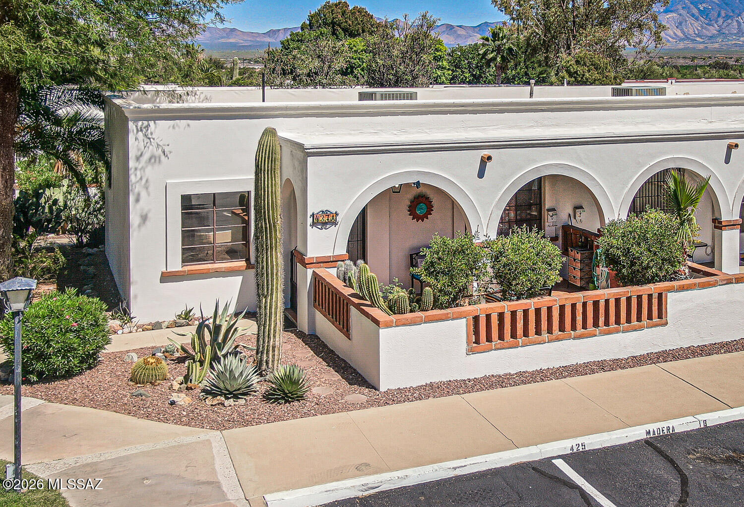 Beautifully maintained, fully furnished corner unit with charming Saltillo tile flooring throughout--no carpet for easy care and a stylish Southwestern feel. Enjoy a tranquil setting next to a lush green common area. Convenient on-site laundry facilities are just a short walk away. Recent updates include new doors, a new refrigerator, and a newer HVAC system and hot water heater for comfort and efficiency. HOA fees cover a wide range of amenities and services: blanket insurance policy, common area and exterior maintenance, garbage collection, pest control, roof repair, sewer, street maintenance, and water. This home offers true lock-and-leave convenience in a welcoming community.