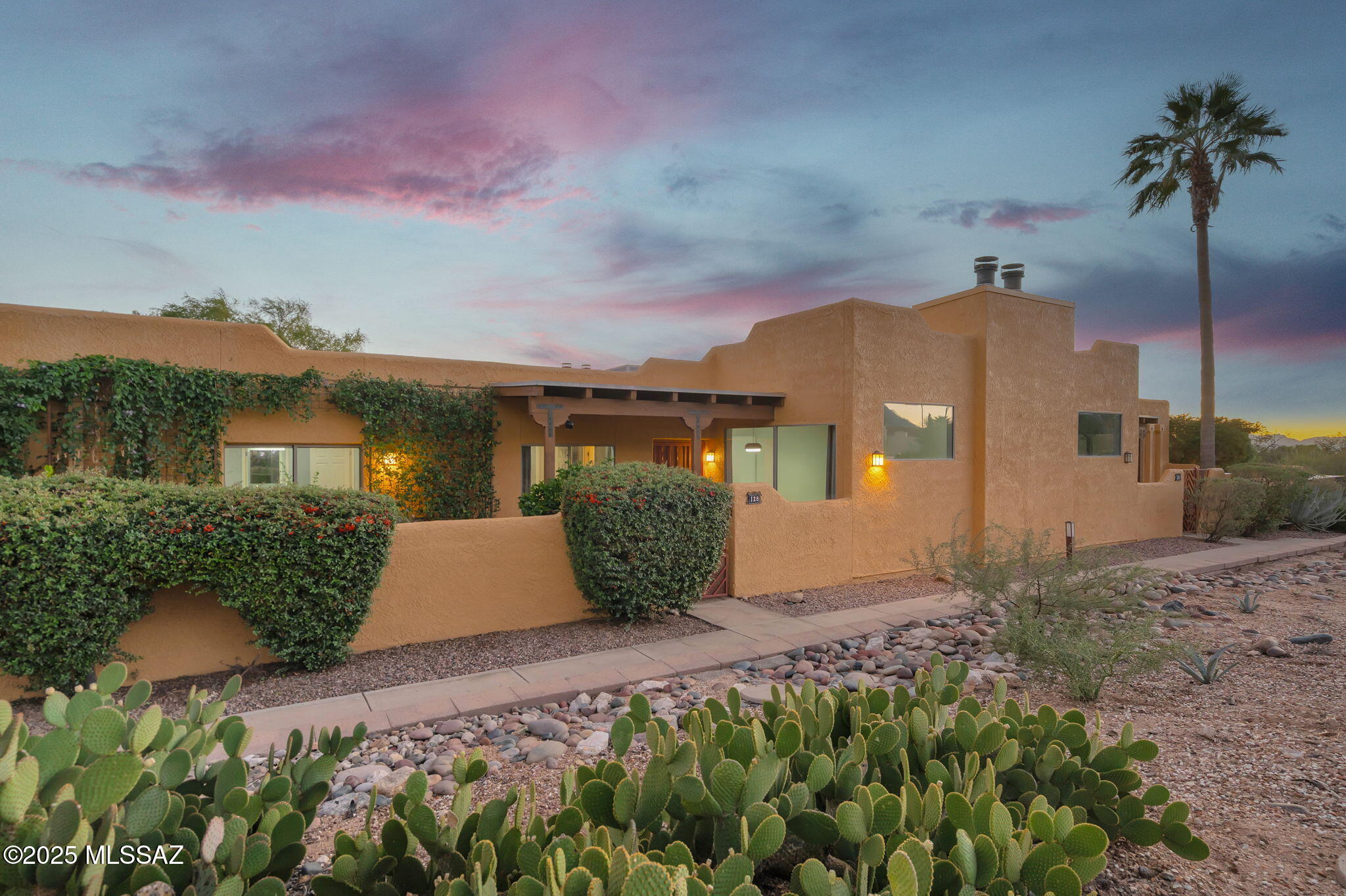 Located at the Reflections in the Catalinas community. Its location provides unobstructed views of Catalina mountains and natural desert landscape. Enjoy remarkable views from its patio or invite them inside through the many north-facing windows in every room.
Elegantly remodeled and improved throughout. Stacked-stone wood-burning fireplace located in an open-floor-plan great room, porcelain wood-imitation tiles throughout and ceramic tiled bathrooms, new vanities, bathroom and kitchen sinks and appliances. Enjoy community amenities such as over-sized pool and spa with breathtaking views , well equipped fitness room and clubhouse, peaceful morning walks in the neighborhood.