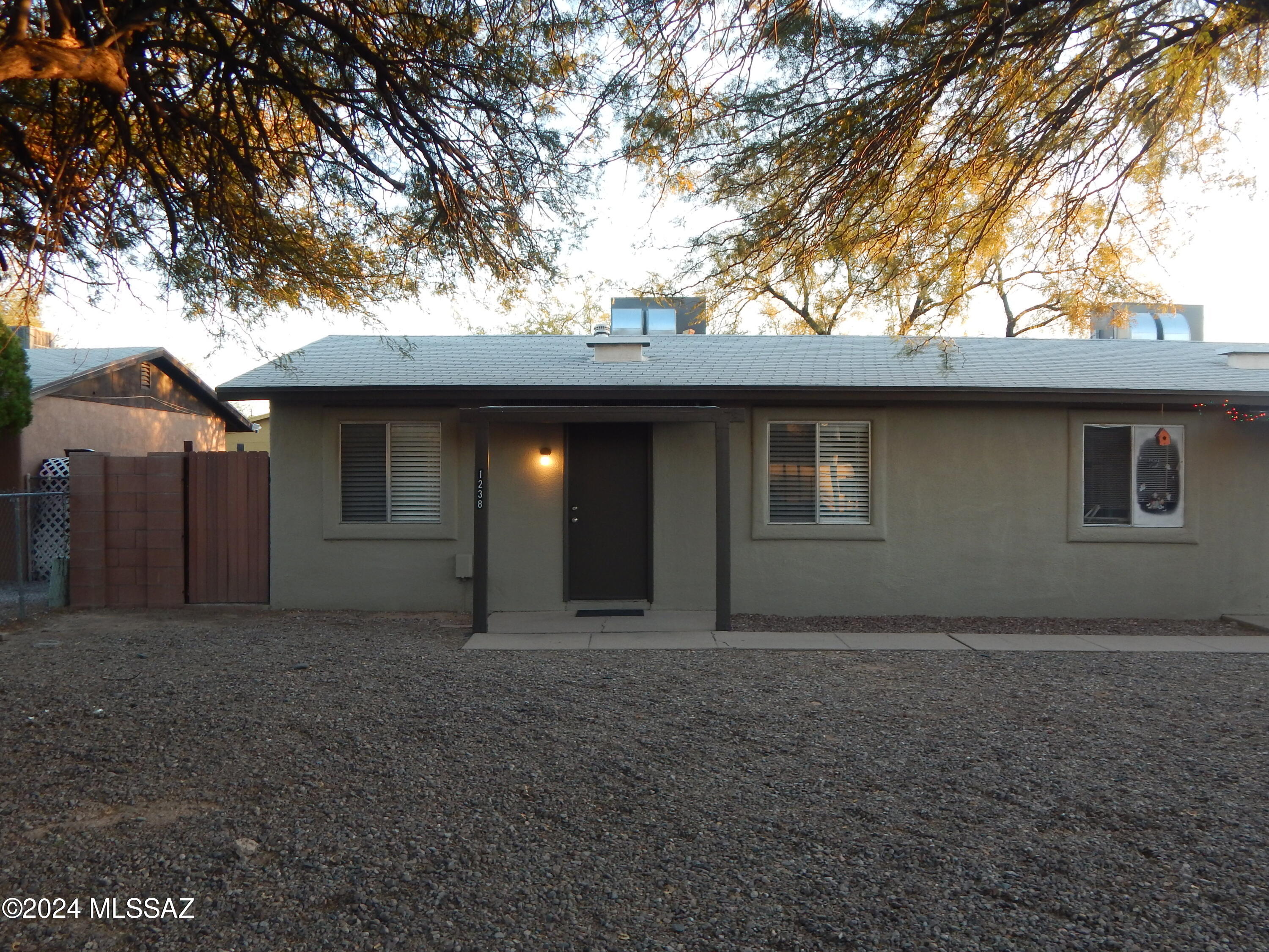 Great & updated home for rent! This home has 2 bedrooms, 1 bathroom, washer and dryer included, private low maintenance backyard with covered patio, side gate & carport. Recently painted interior and exterior. Includes stainless steel refrigerator, glass top electric range/stove & microwave. Tile flooring throughout. Located close to schools, bus stop, restaurants & much more! All electric appliances, no gas. Call Agent for more details or to schedule a showing.