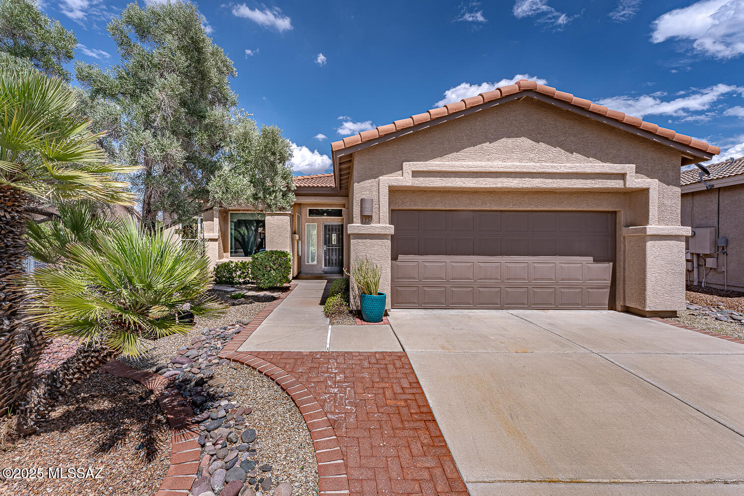 Exquisitely updated 3-BR / 2-BA home with 1913 sq ft in Quail Creek. Major interior updates include new tile flooring and baseboards throughout. (no carpet!) All new windows and patio door with quality Tucson Windows & Doors (includes lifetime warranty for the new owner). New Trane HVAC (2023), water softener (2024) full Kitchen remodel with new 40'' cabinets w/ upgraded 15'' depth including hidden drawers wine rack & pantry organizer. Granite countertops, stainless steel appliances, LED can lights, new pendant lights and fan. Hunter Douglas Silhouette blinds in light filled kitchen eating area. Built in entertainment unit with stunning lighted glass display cabinets in great room. Formal dining in large Great Room. Bay window in spacious Primary BR with beautifully updated bathroom. granite countertops, new shower w/attractive tile and decorative accents, new shower door, sinks, fixtures, lighting and
closet organizer. Custom stained glass windows in both updated bathrooms and entryway. Updated Laundry Room includes new cabinets w/granite countertop for added work space, washer/dryer.
With 3 full bedrooms, you can invite and entertain your guests in grand style! Low maintenance yard with covered patio and extended paverstone patio to enjoy the mountain view from the rear yard. Interior has been painted throughout.
2-car garage with wall of storage cabinets.
This meticulously maintained home has only been occupied seasonally. It's move in ready and ready for you to enjoy - along with the Quail Creek resort amenities!