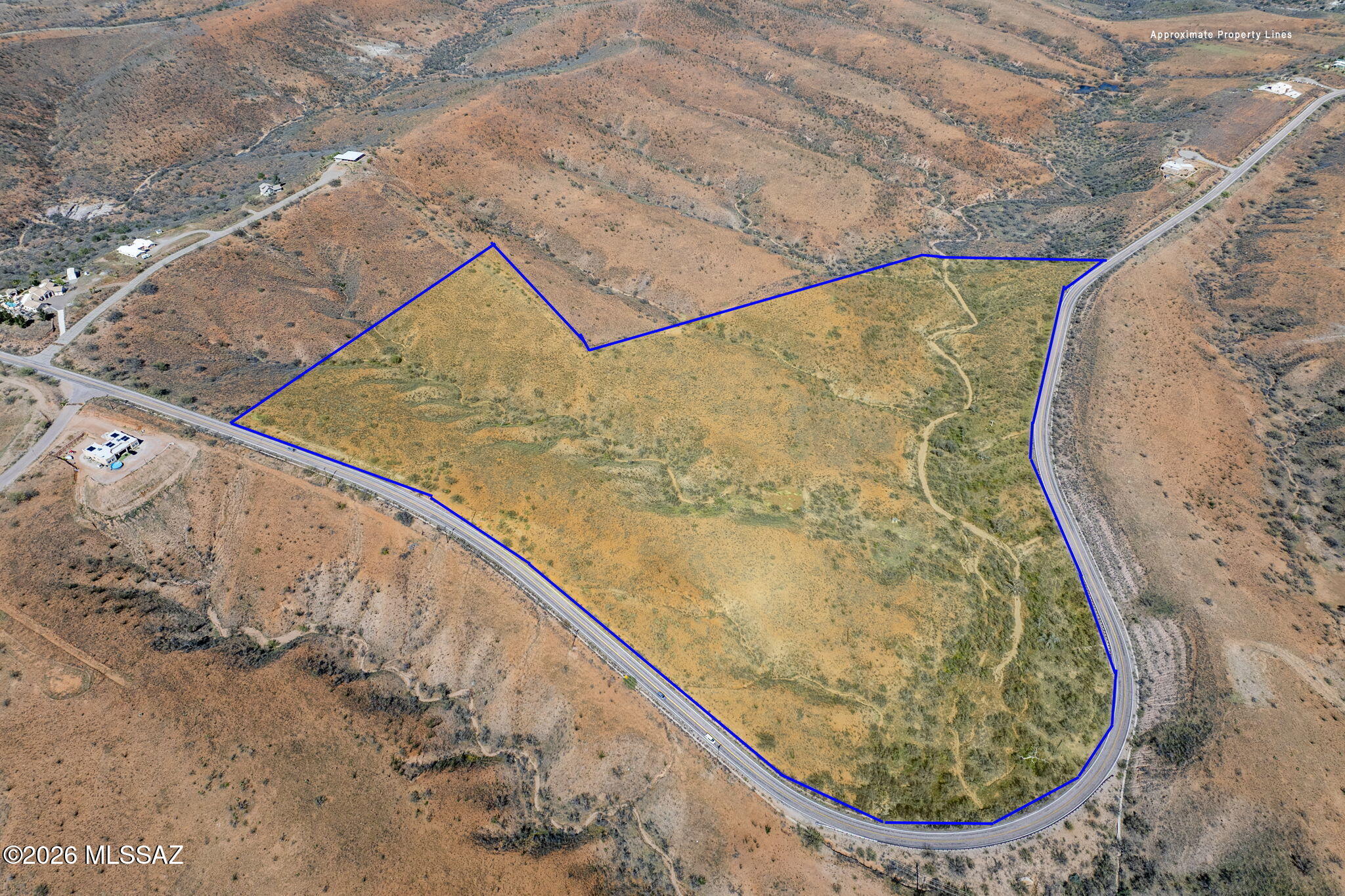 Extra large parcel that could be divided into smaller parcels.  Perfect for cattle grazing or horse facility.  Could also be used for residential with parcels being determined.  Well and electric available.  Close to Lake Patagonia for recreational activities such as boating, fishing or swimming.