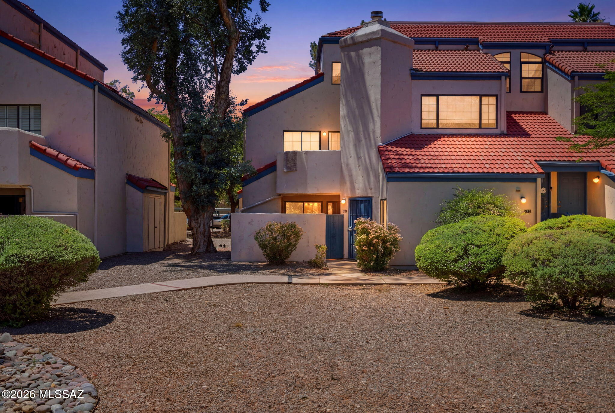 Discover comfortable Tucson living in this beautifully maintained ground-floor condo located in one of North Central Tucson's most desirable communities. This inviting 2-bedroom, 2-bath split floor plan offers an open-concept design with tile flooring throughout the main living areas and bathrooms. The spacious primary suite features a private full bath and linen closet, while the covered patio provides the perfect spot to enjoy your morning coffee or unwind in the evening.

Enjoy peace of mind with a newer HVAC system, newer water heater, and recent roof repairs. Additional conveniences include two storage rooms--one interior and one exterior--as well as an included refrigerator, washer, and dryer. Community amenities include a sparkling pool, spa, and tennis courts. Ideally situated just steps from the Rillito River Walk and Bike Path, St. Philip's Plaza, Trader Joe's, popular restaurants, shopping, Banner Medical Center, and the University of Arizona, this condo offers the perfect blend of comfort, convenience, and location.
