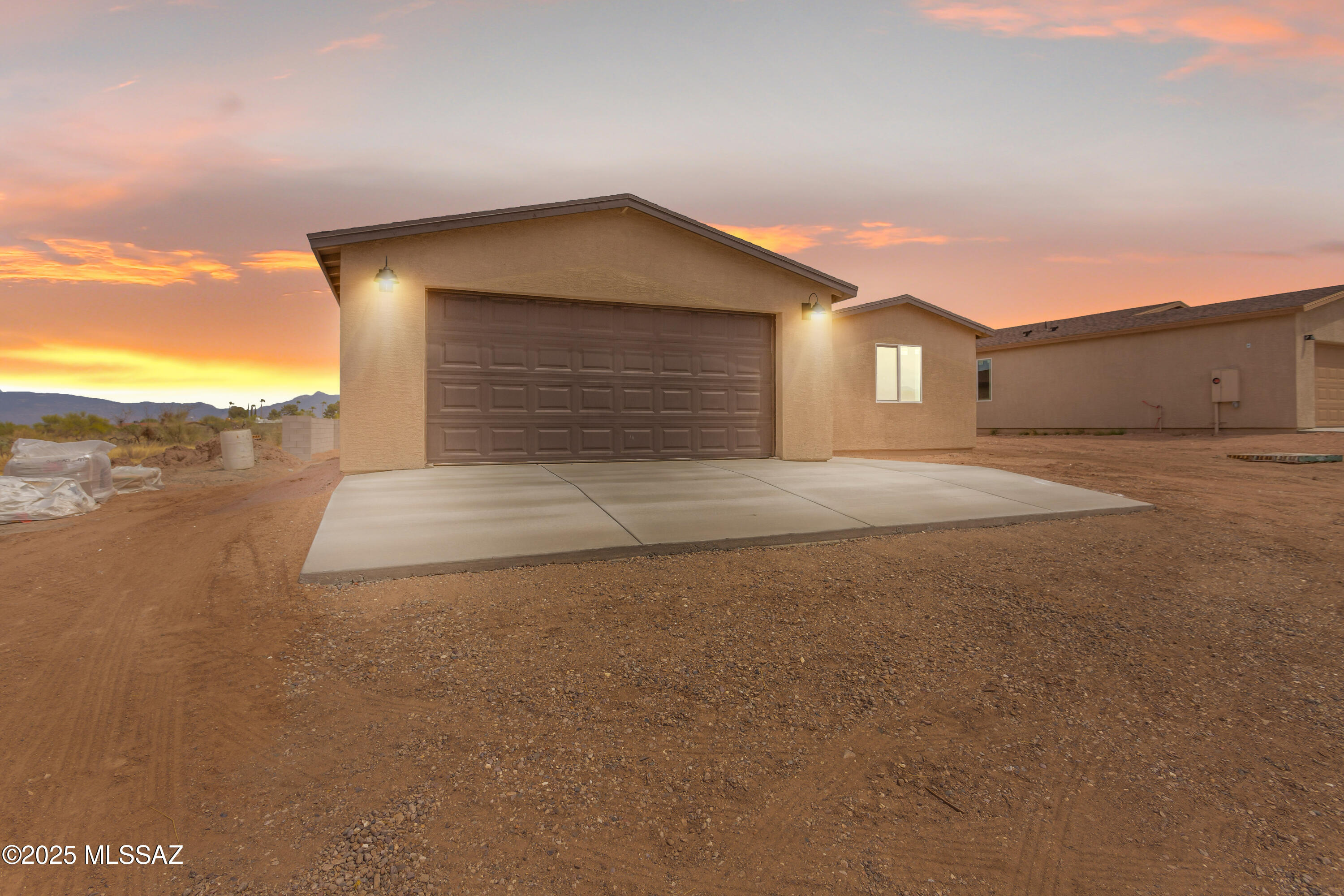 Brand NEW construction custom build Gem that is turn-key! This move-in ready home features an over .15 acre lot, NO HOA, privacy block wall, and beautiful mountain views! This contemporary style beauty is built with high quality materials, a 2 car extended length garage, and an appealing open concept. With convenient features like ceramic flooring throughout, recessed lights, ceiling fans, and upgraded countertops. This home is roomy and bathes in natural light from the moment you step in! With an ample kitchen that has white custom cabinetry, gorgeous granite, new SS appliances, a pantry, and a breakfast bar to host guests. That Segways into your ample living room space for family gatherings. The primary bedroom is very roomy, has a true walk in closet, and cooling ceiling fan. With an ensuite bathroom that has dual sinks with matching granite, and a premium walk-in shower where you can unwind in. Enjoy family time or the company of your guests in your huge private backyard. Dream up your ideal oasis and bring it to life! Your home is only minutes away from parks, entertainment, restaurants, and the award-winning Vail school district. Don't compromise! Come see it, fall in Love and stay.