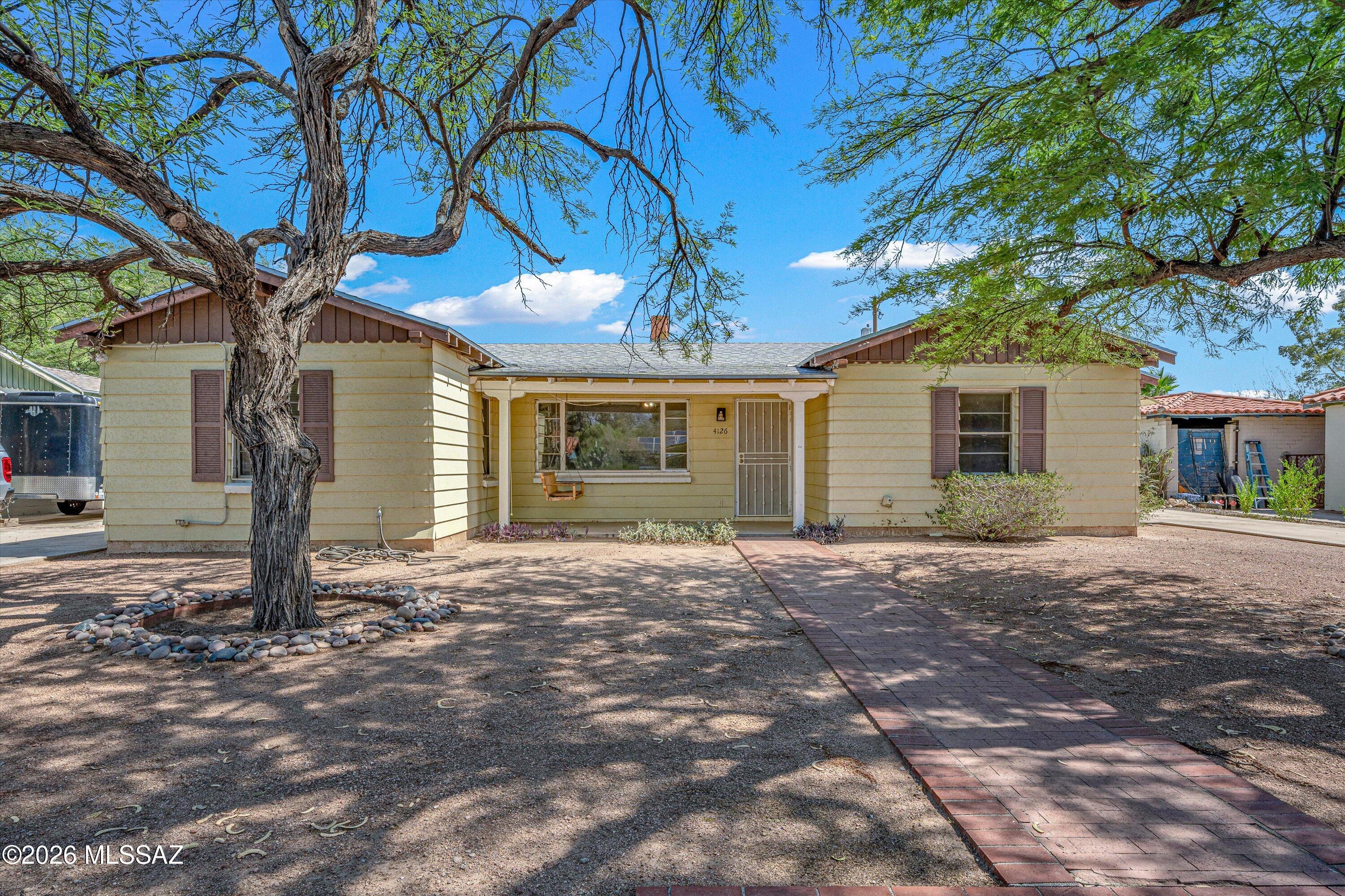 Welcome to this centrally located gem nestled in a quiet, established neighborhood. The main home features 3 bedrooms, 2 baths, and a bonus room
perfect for a home office, den, or AZ room, the possibilities are endless. As an added bonus, a 1982 built guest house with 1 bedroom and 1 bath sits on
the property, offering incredible flexibility. Guest Huse is occupied at $825/month, it's a ready made income stream. Ideal for investors or homeowners
looking to offset their mortgage. Enjoy ample parking for guests, all in a convenient location close to everything the city has to offer while maintaining
the peace and quiet. Whether you're looking for a multi-generational living situation, a savvy investment property, or a home with room to grow, this
property checks all of the boxes.