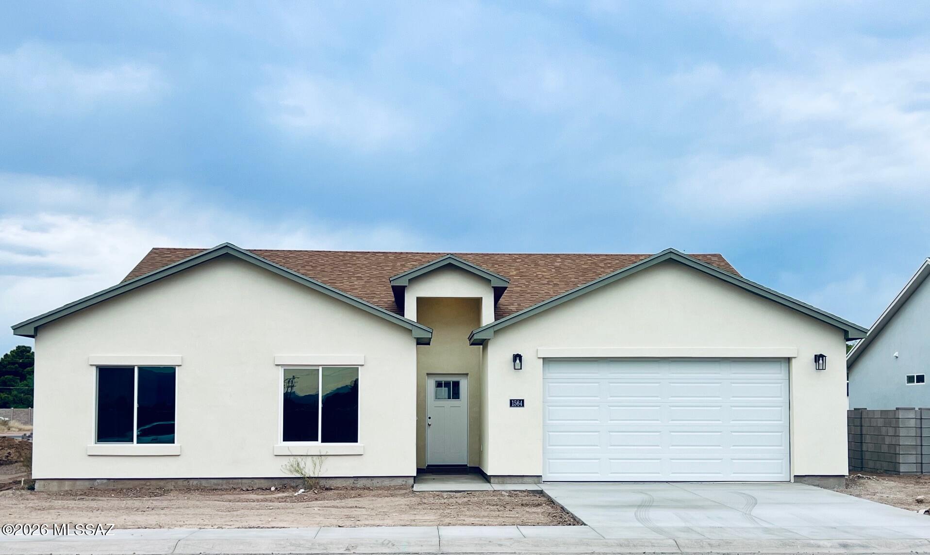 Don't miss out on this extra spacious new build located in the heart of Safford. You will love this new 5 bedroom 3 bath home with large, open living and dining areas. The master suite has a large bathroom with a tiled shower and soaking tub. You will enjoy living within walking distance to schools and shopping. A block wall will be added before closing. Call for an appointment today.