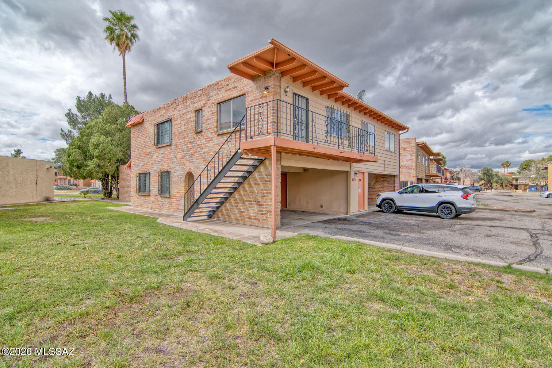 Whether you're a first-time homebuyer, investor, winter visitor, or looking to downsize, this move-in-ready NE Tucson upstairs condo offers exceptional value and low-maintenance living. Features include wood laminate flooring, fresh paint, an updated bathroom, new ceiling fans, and a private balcony with beautiful mountain views. Enjoy two community pools, lush grounds, and a convenient location close to shopping, dining, and everyday amenities. The HOA covers water, sewer, trash, roof and exterior maintenance, pest control, laundry facilities, and even the water heater, helping keep ownership simple and affordable. Rentals are allowed, making this an excellent opportunity for both personal use and investment potential..