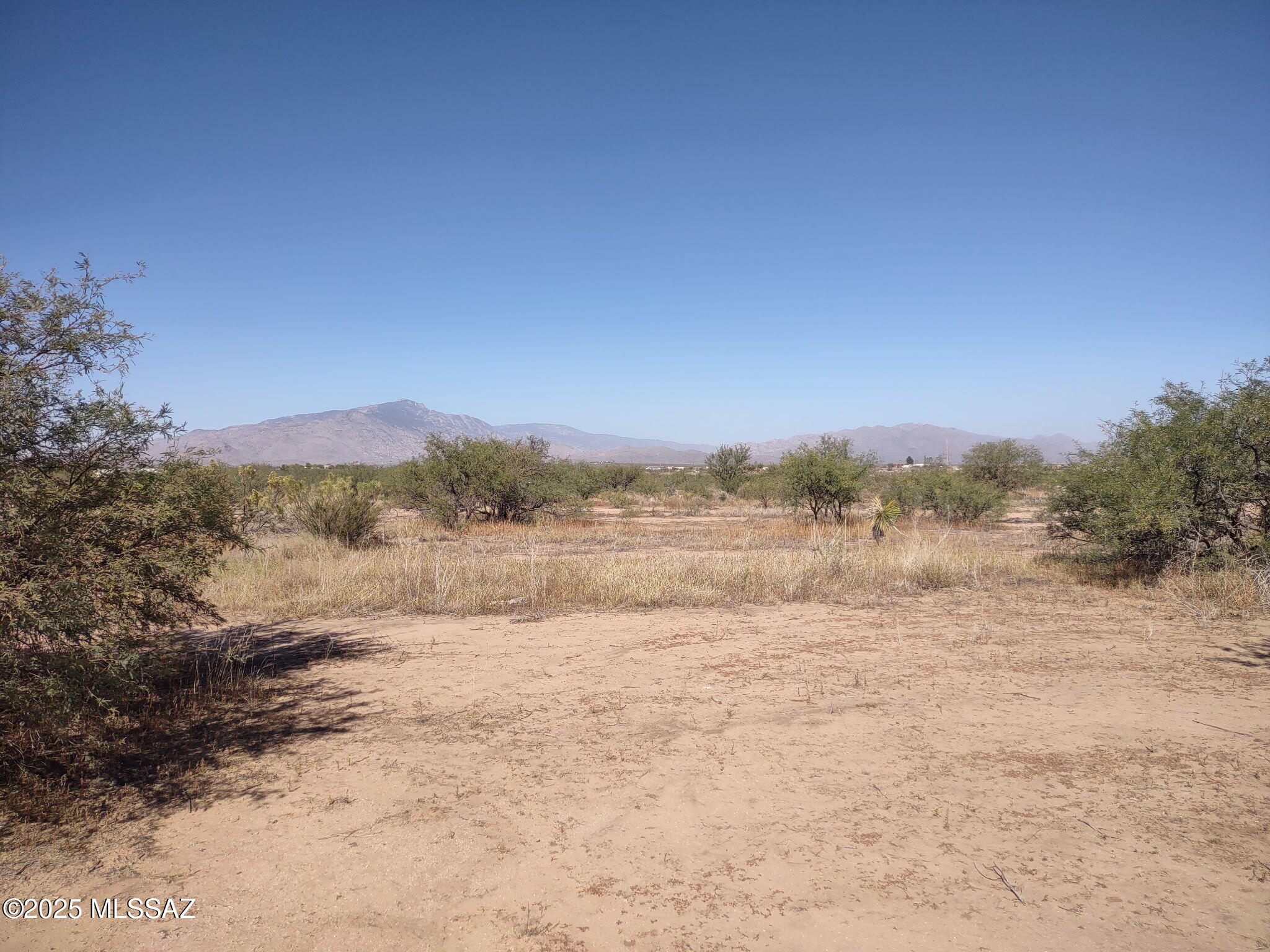 Recently surveyed 8 acre lot ready for your forever home. Utilities available at the lot line including water from private water company. Lot offers beautiful views and privacy but easy access to i10 for shopping and other services. All corners are staked with red survey flags and this parcel can be accessed from Tequila Trail. Buyer to do all due diligence regarding utilities. Parcel was recently split, taxes reflected are before parcel was split and will have its own parcel number and legal description at closing.