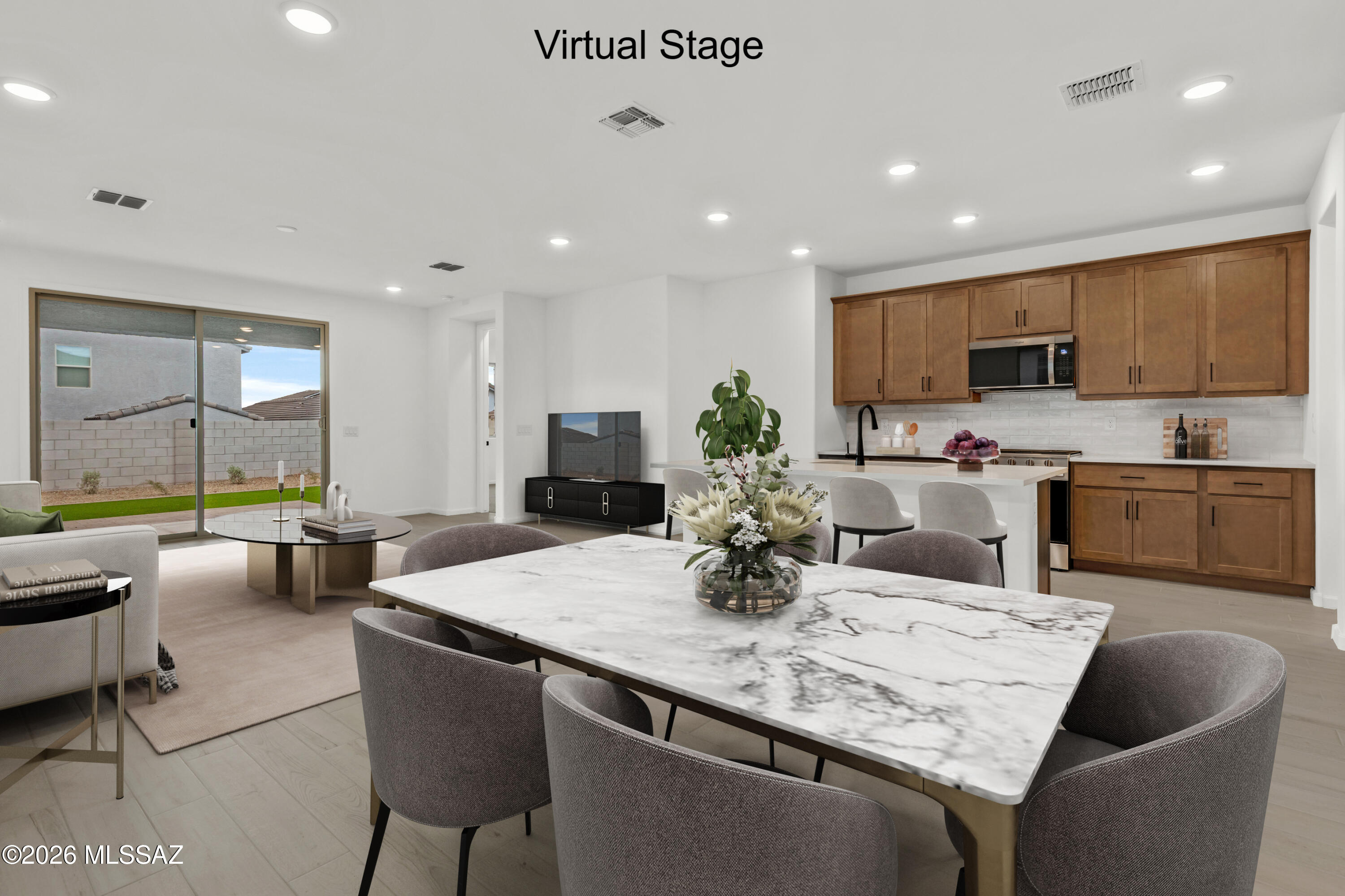 Introducing the Ivory floorplan with Rustic Spanish elevation. A 2-story home featuring 3 bedrooms, 2.5 baths, and a 2-car garage. Enjoy an open Greatroom layout with roomy dining area & kitchen with center island. The upstairs Loft area is perfect for a home office or bonus living space. The Owner's suite includes a large walk-in closet, walk-in shower, dual-sink vanity, and linen closet. The kitchen features walk-in pantry, Whirlpool appliances and great counter & cabinet space. Washer/dryer & Blinds are included for added a convenience. Backyard landscaping included.