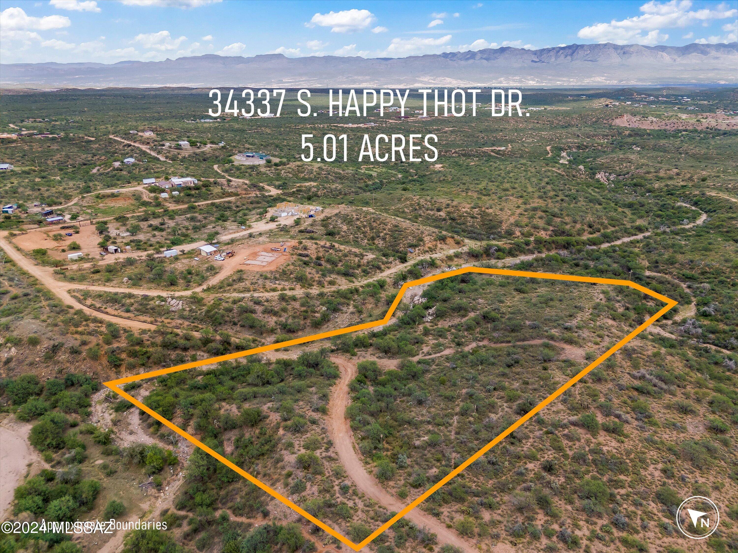 5-acre horse property with sweeping mountain views of the Santa Catalinas, Rincons, San Pedro Valley, and Galiuro Mountains. Located at approx. 4,000 ft elevation with mature mesquite trees and privacy. Major advantage over nearby raw land includes shared well access and electric at the lot line (buyer to verify). Property borders Coronado National Forest with nearby Arizona Trail access for recreation and riding. Access is via natural roadway conditions; buyers should independently verify legal access and easements. Site-built or manufactured homes allowed. No HOA or road maintenance agreement. AWD/4WD recommended.
